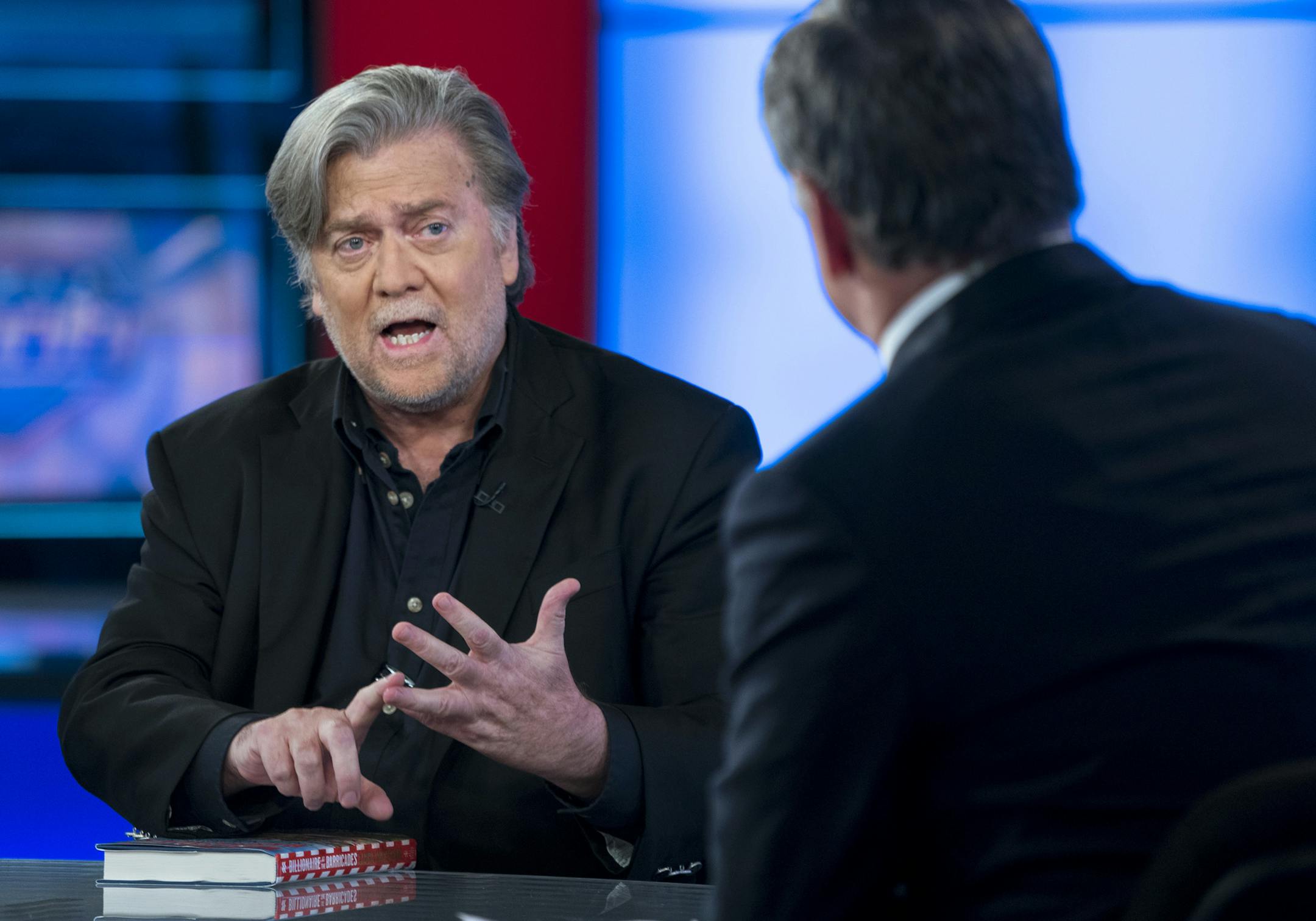 Former White House strategist Steve Bannon, left, shown on Fox News Channel's "Hannity"program on Monday, called his push of GOP primary challengers a "populist nationalist conservative revolt" in a speech to religious conservatives in Washington.