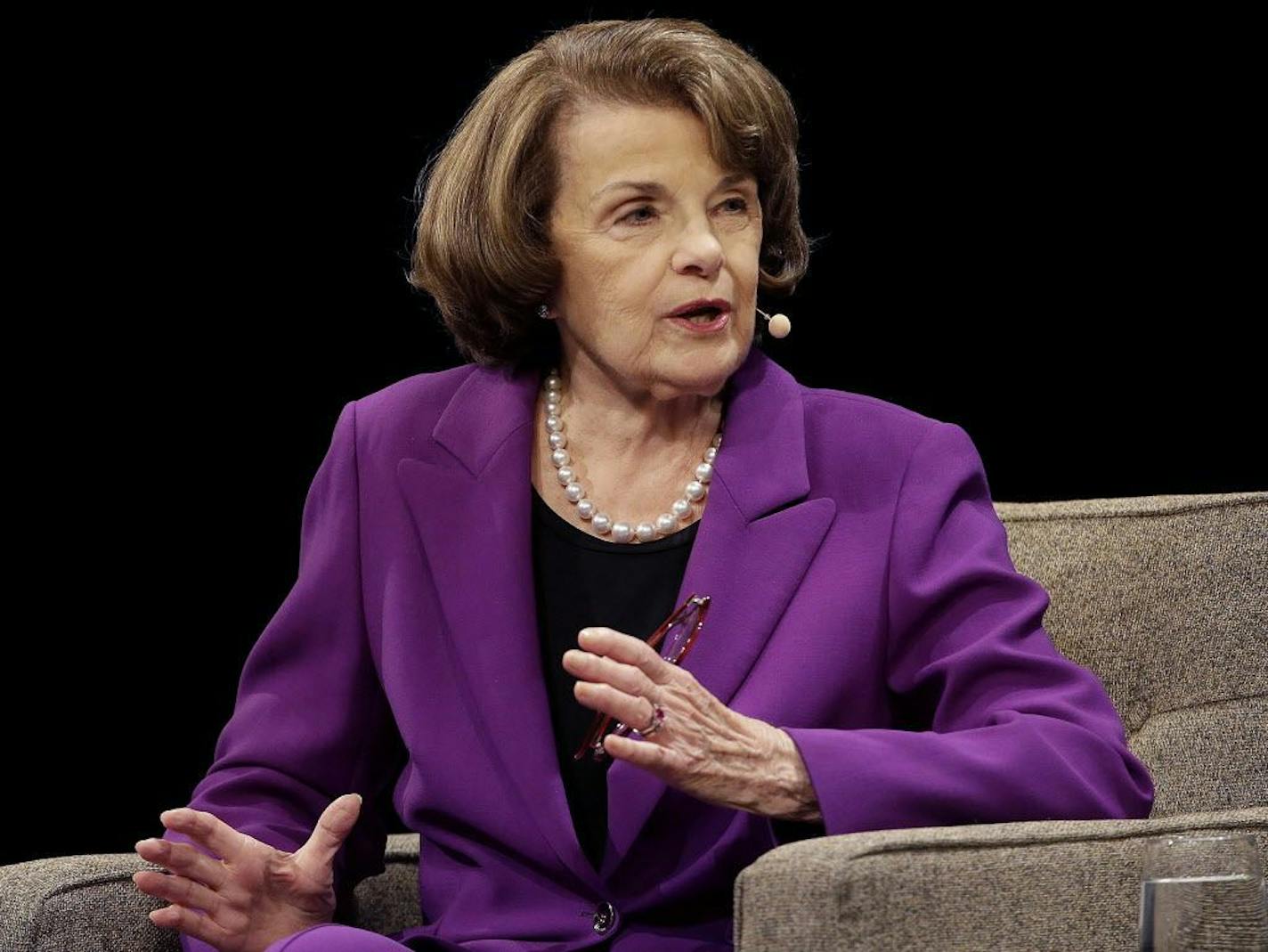 FILE - In this Aug. 29, 2017, file photo, United States Sen. Dianne Feinstein, D-Calif., speaks at the Commonwealth Club in San Francisco. Feinstein, a veteran California Democrat, said Monday, Oct. 9, 2017, that she's running for another term. The 84-year-old took to Twitter to declare that "I'm all in."