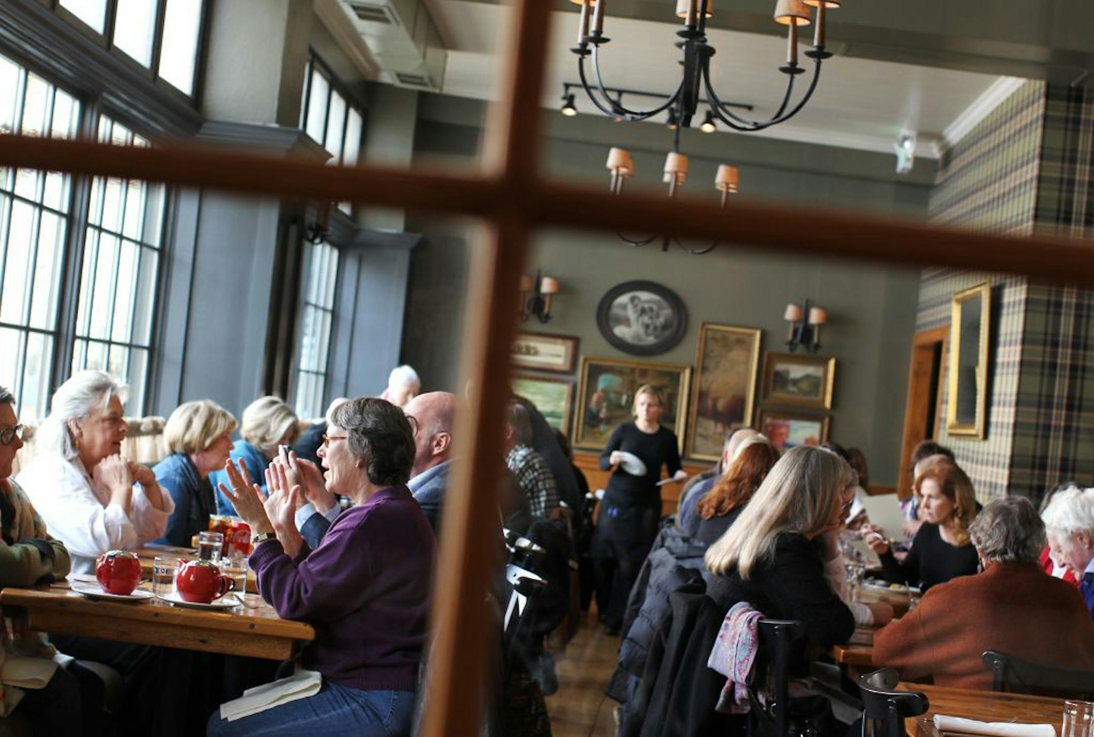 A window pane frames the open dining area at The Kenwood restaurant in Minneapolis November 14, 2012.
