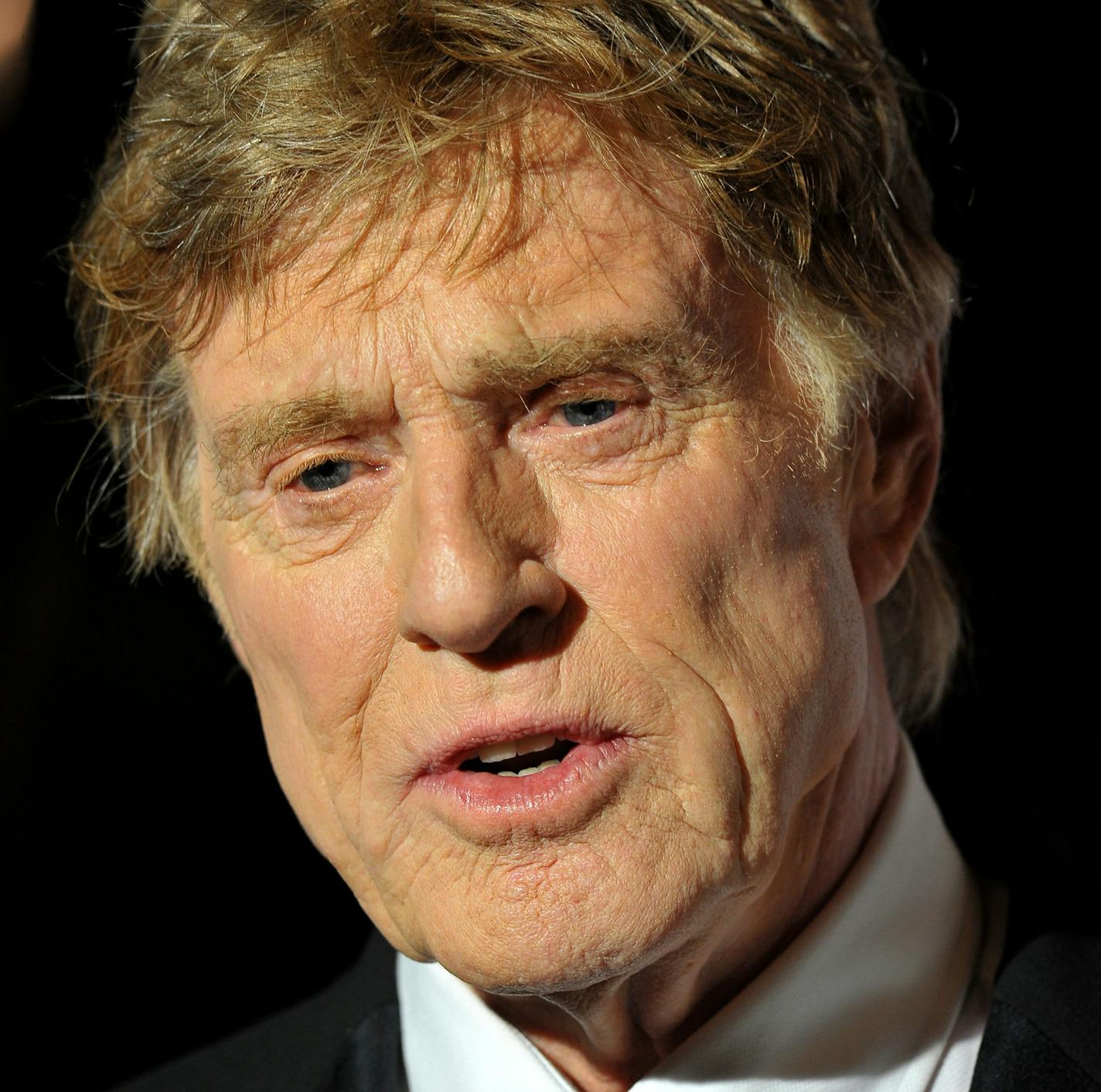 Actor Robert Redford arrives at Monaco palace before receiving the 2015 Prince Rainier III Award, during the Princess Grace Foundation gala in Monaco, Saturday, Sept. 5, 2015. The Princess Grace Foundation is dedicated to identifying and assisting emerging theater, dance, and film talent by awarding grants. (AP Photo/Christian Alminana)