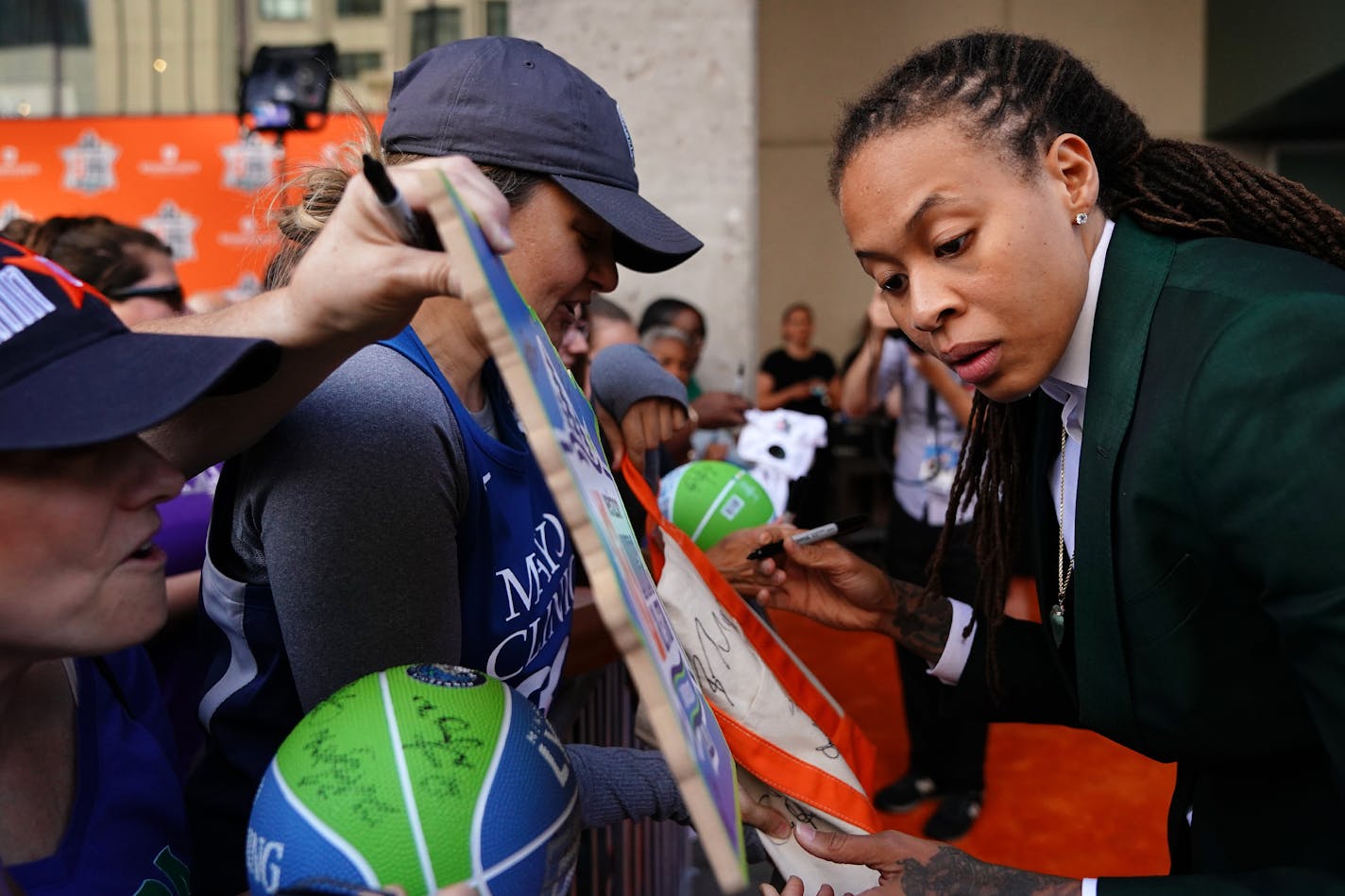 Minnesota Lynx guard Seimone Augustus signed autographs for fans as she arrived on the orange carpet. ] ANTHONY SOUFFLE • anthony.souffle@startribune.com