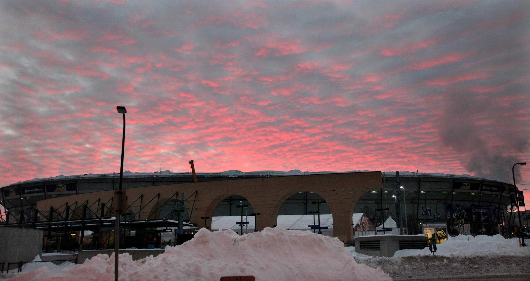 The Metrodome is seen at sunrise Tuesday, Dec. 14, 2010 in Minneapolis. Frigid air whipped through a desolate Metrodome on Monday as crews began inspecting the Minnesota stadium's nearly three decades-old roof after it collapsed under the weight of heavy snow that pounded the Twin Cities and forced the Vikings to move their game to Detroit.