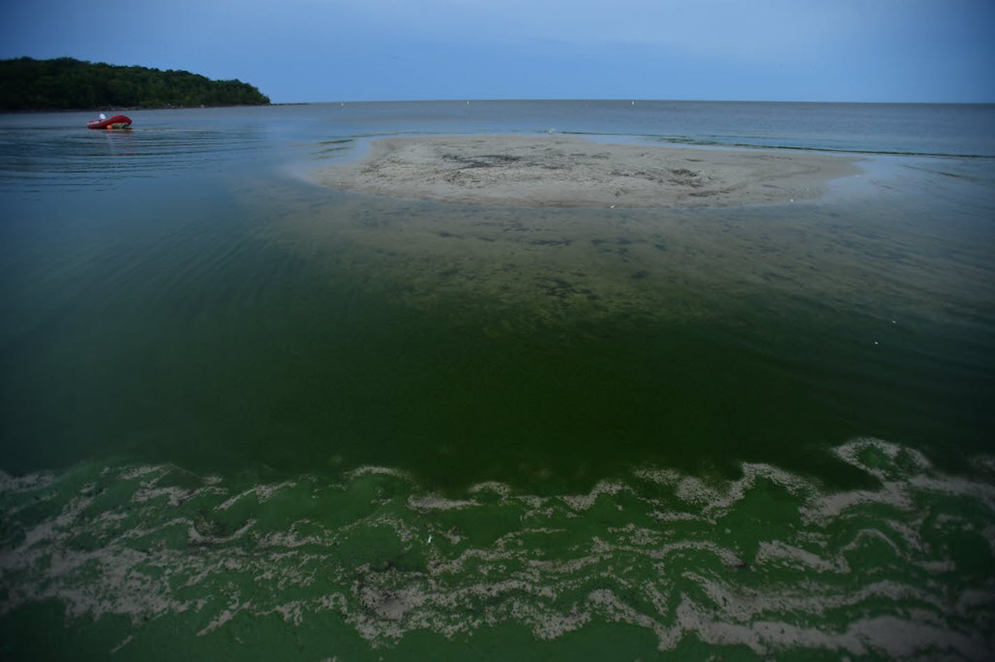 Northern waters, such as Lake Winnipeg, above, are warming, allowing harmful algae to bloom.