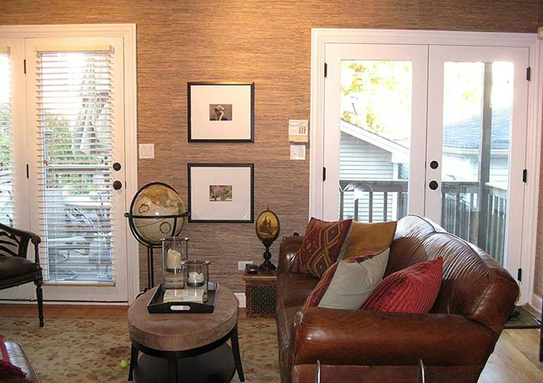 Textured wallpaper like the one in this Chicago living room can be subtle but still add a unique quality. (Photo courtesy Angie's List member Laura D./TNS) ORG XMIT: 1162590