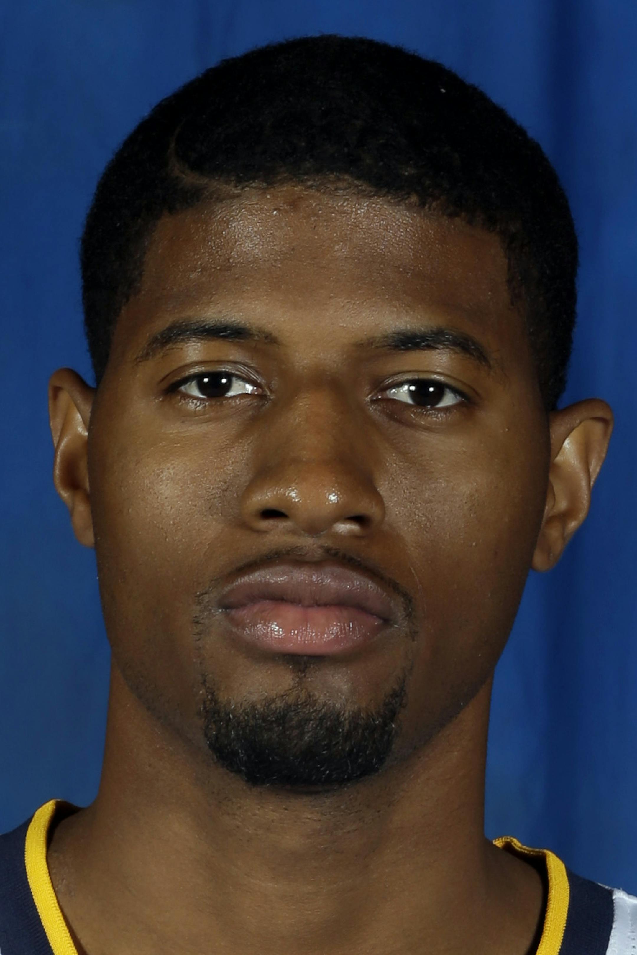 Indiana Pacers' Paul George poses for a photograph during NBA basketball media day Friday, Sept. 27, 2013, in Indianapolis. (AP Photo/Darron Cummings) ORG XMIT: NYOTK
