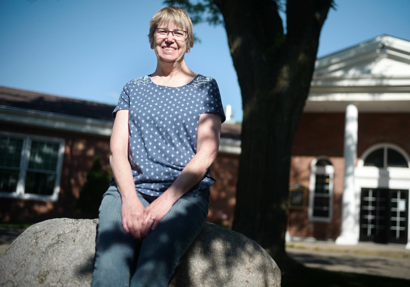 Tracy Birttnen,61, is the church historian who grew up playing near or on the Red Rock growing up since she was 6-7 years old. The Newport United Methodist Church plans to return the Red Rock -- which sits on church property -- back to the Dakota people, after months of discussion with church and tribal leaders about the significance of the sacred rock's history to both communities.] Richard Tsong-Taatarii/Richard Tsong-taatarii@startribune.com