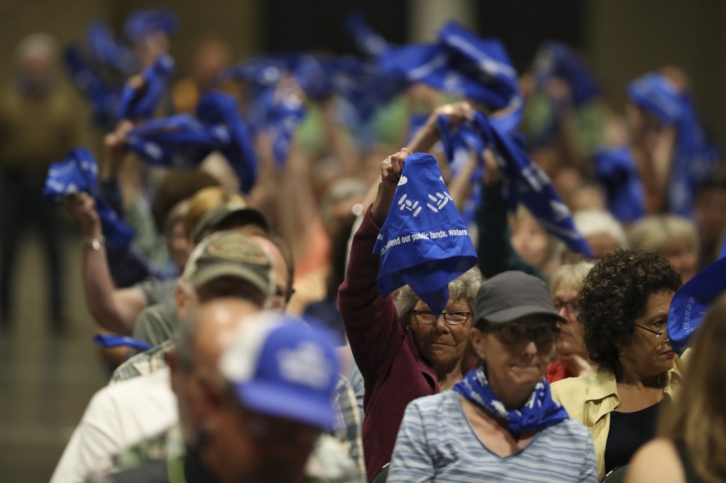 Members of the crowd in attendance at the hearing waved handkerchiefs instead of applauding the speakers.