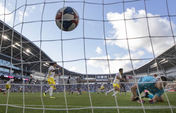 Santiago Moar (11) of New Mexico United shot the ball past Minnesota United goalkeeper Vito Mannone (1) for a goal in the first half.