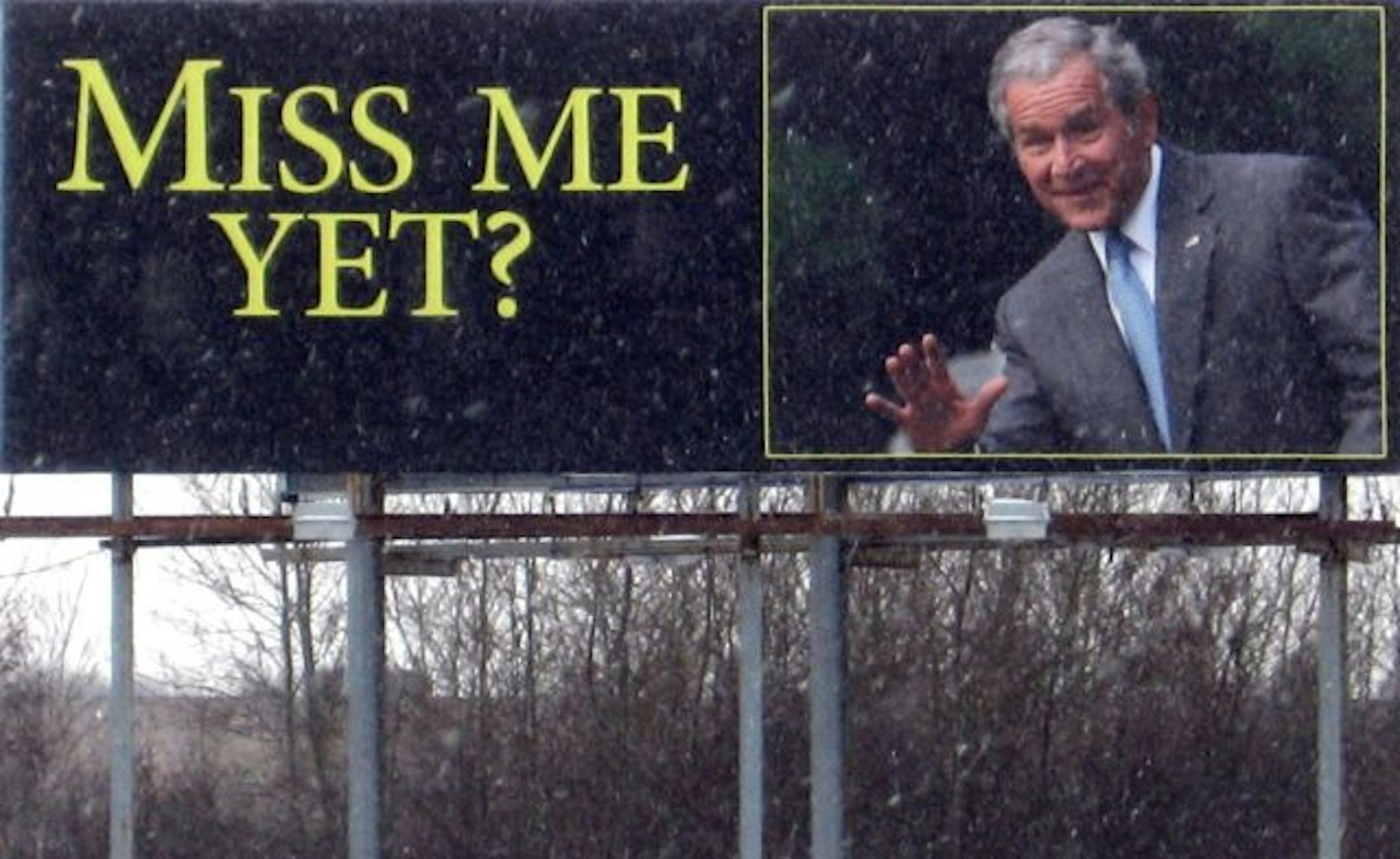 A billboard along Interstate 35 near Wyoming, Minn., carries an image of former President George W. Bush and reads "Miss me yet?"
