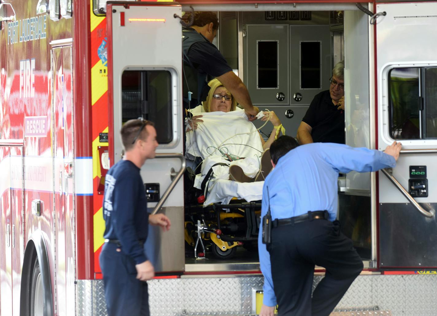 A shooting victim arrives at Broward Health Trauma Center Friday, Jan. 6, 2017 in Fort Lauderdale, Fla. Authorities say a lone shooter opened fire at the Ft. Lauderdale-Hollywood International Airport Friday, killing "multiple" people before he was taken into custody. The airport suspended operations as law enforcement authorities rushed to the scene.