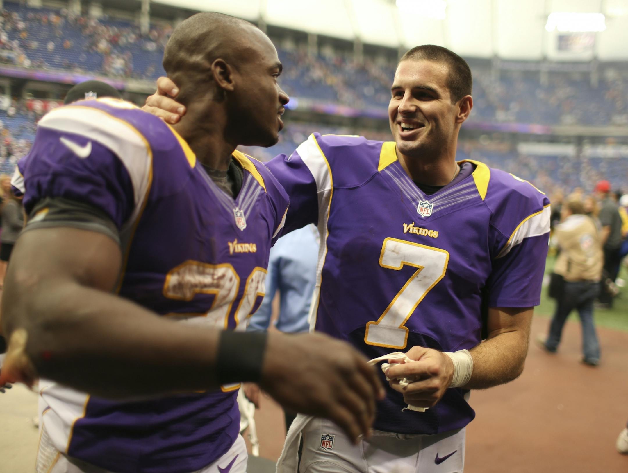 Vikings quarterback Christian Ponder and running back Adrian Peterson greeted each other as they jogged off the field after the Vikings' upset of the Niners.