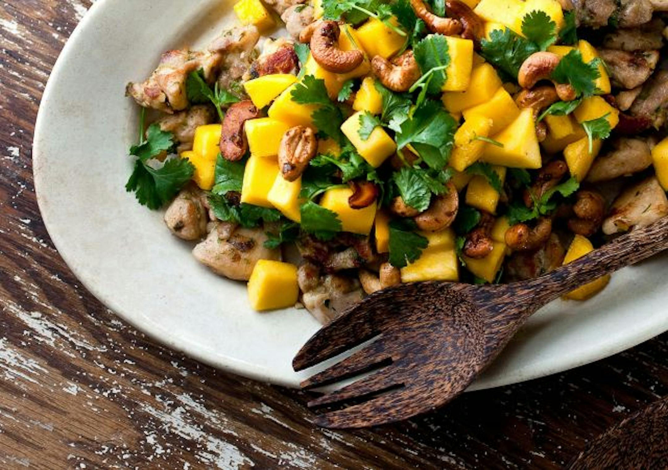 Mango with Black Pepper Chicken, Rum and Cashews.
