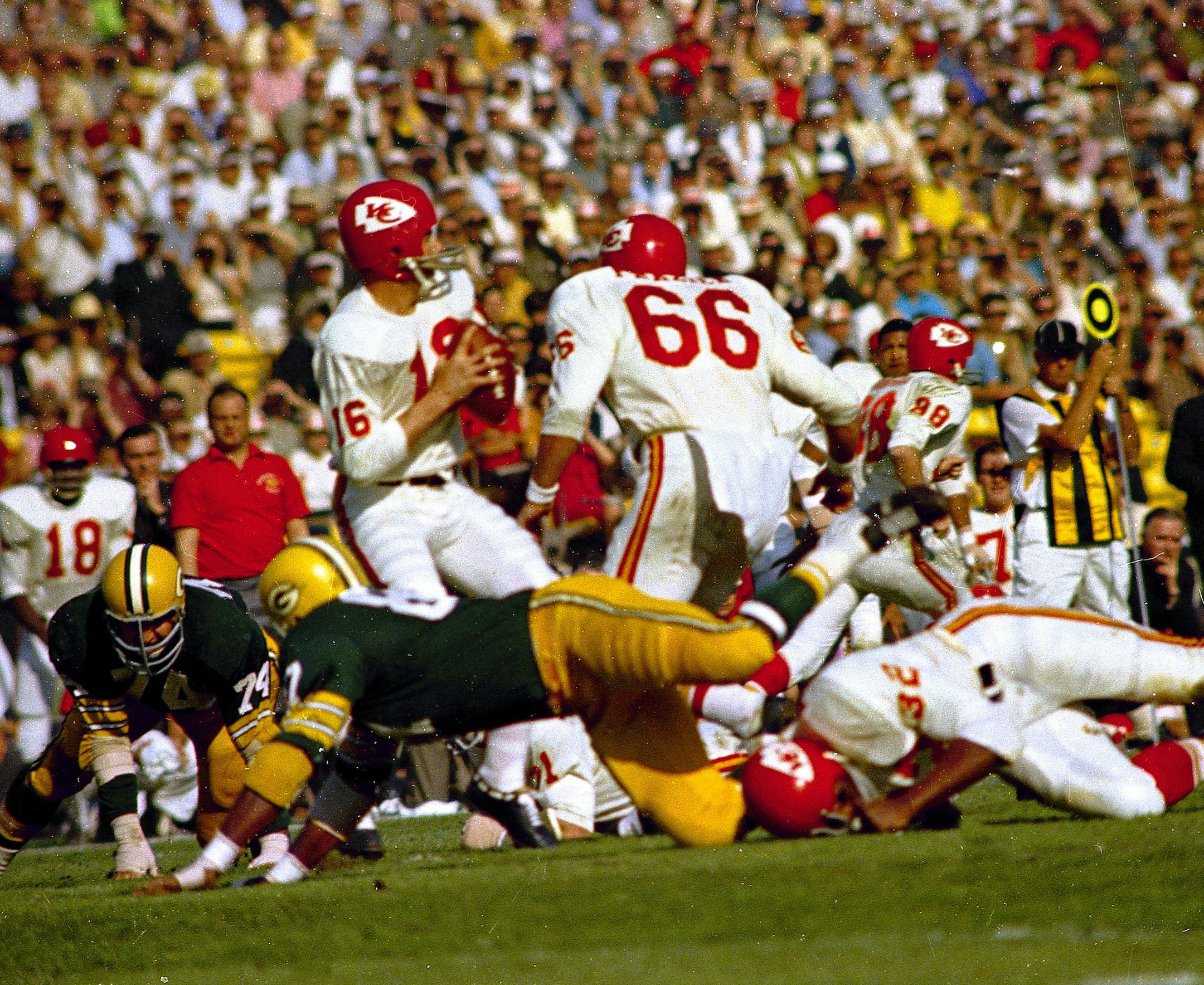 Kansas City Chiefs' quarterback Len Dawson (16) gets ready to release the ball during the first Super Bowl, Jan. 15, 1967, against the Green Bay Packers at the Los Angeles Coliseum in Los Angeles, California. The Green Bay Packers won the game. (AP Photo) ORG XMIT: APHS112614