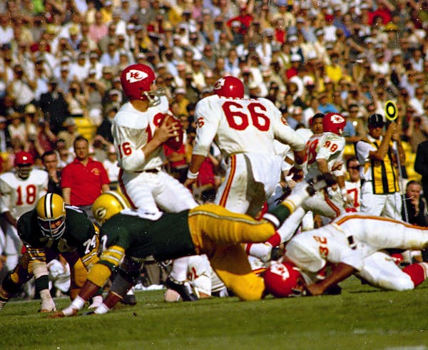 Kansas City Chiefs' quarterback Len Dawson (16) gets ready to release the ball during the first Super Bowl, Jan. 15, 1967, against the Green Bay Packe