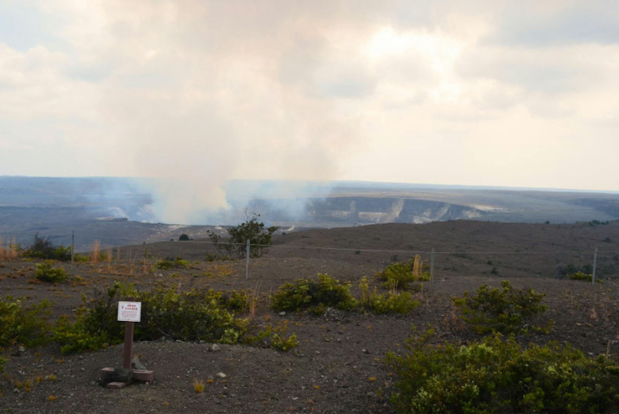 The volcano caldera at Volcanoes National Park on Hawaii still smolders.