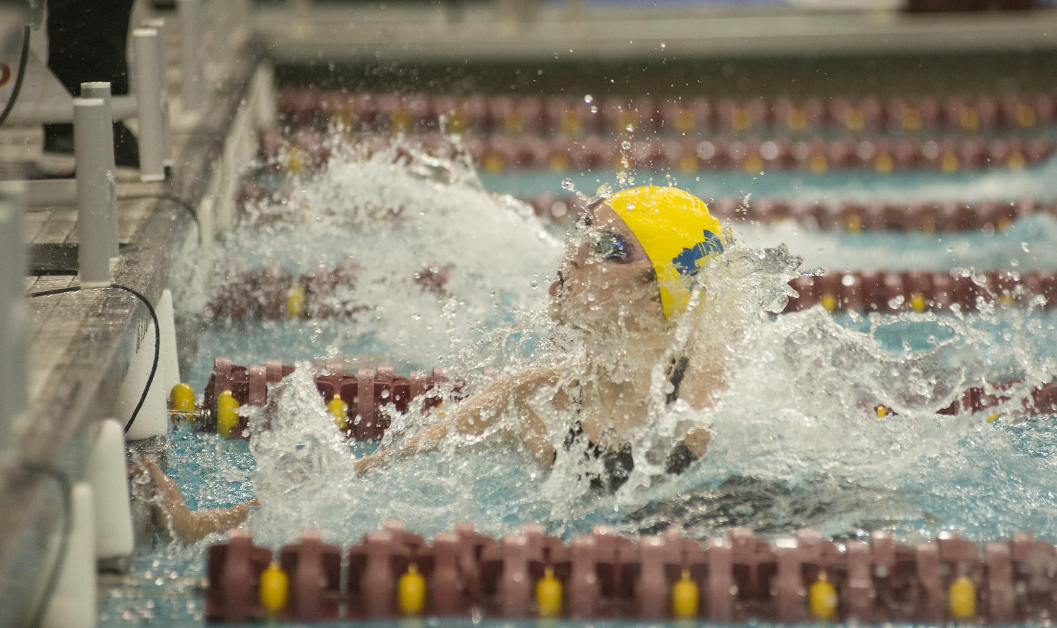 Madison Preiss hit a turn Friday at the University of Minnesota Aquatic Center. Her 13-member Wayzata contingent won its third Class 2A team championship in a row.