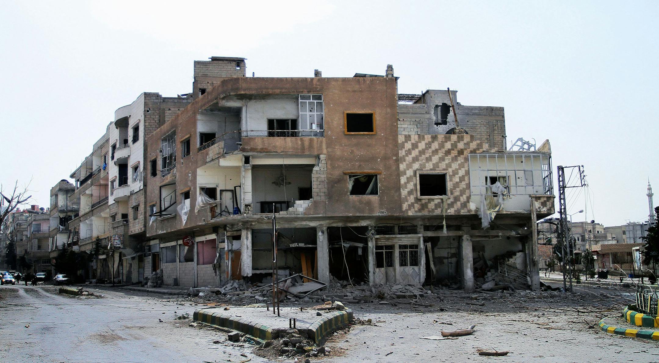 Damaged buildings are seen in Yabroud town, Syria, Sunday, March 16, 2014. Syrian troops backed by Hezbollah fighters seized a key rebel supply town on the Lebanese border on Sunday, driving them from the area and scoring a major blow against them in the three-year-old-conflict. The fall of Yabroud immediately emboldened government forces to attack nearby rebel-held towns, pressing forward in what has been nearly a yearlong advance against rebels fighting to overthrow President Bashar Assad. (AP