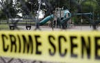 A playground near the baseball field is cordoned off with police tape as the investigation continue at the scene in Alexandria, Va., Thursday, June 15