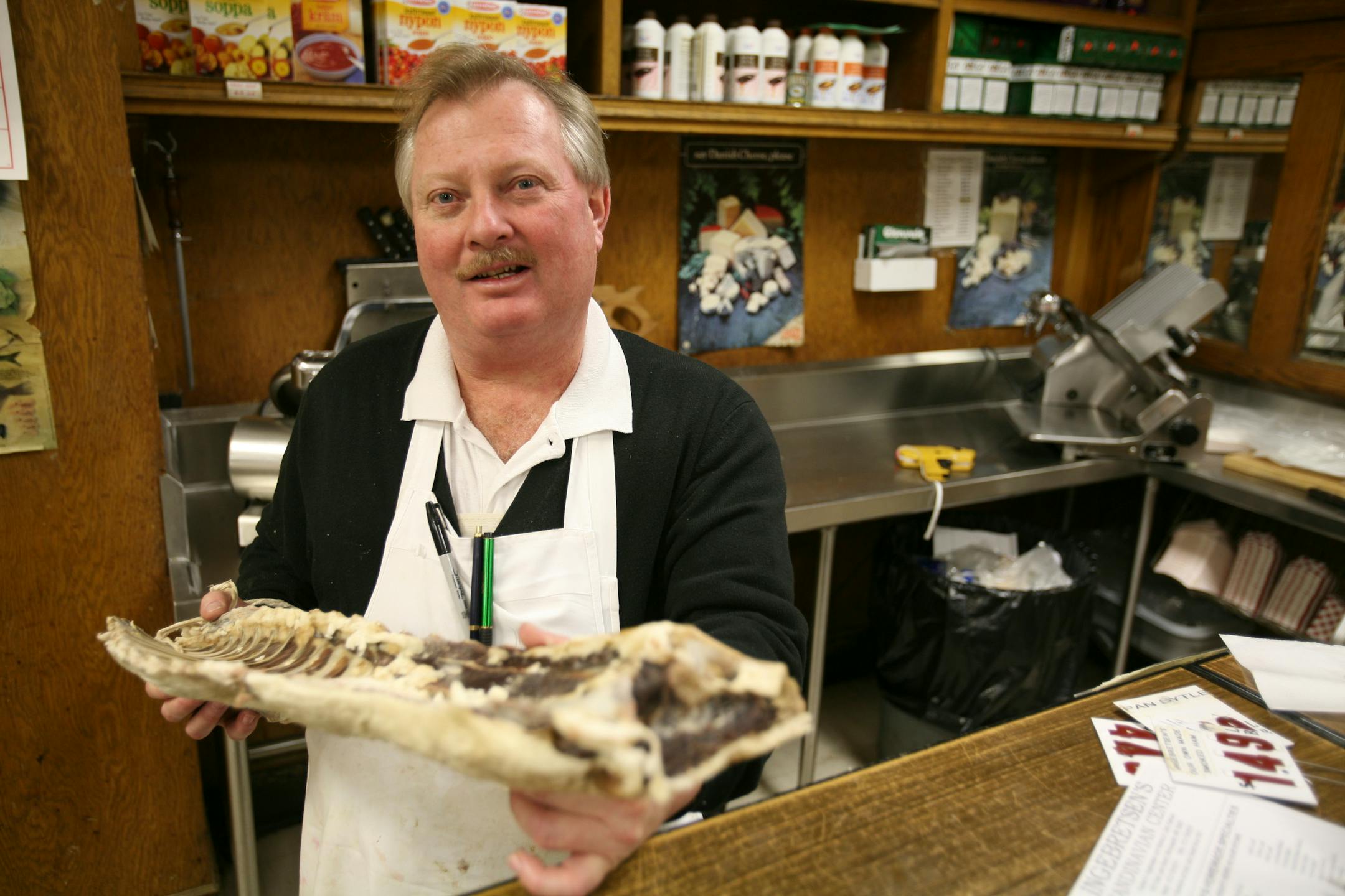 Steve Dahl, one of the owners of Ingebretson's, stocks specialty cuts of meat favored by Norwegians and Swedes.