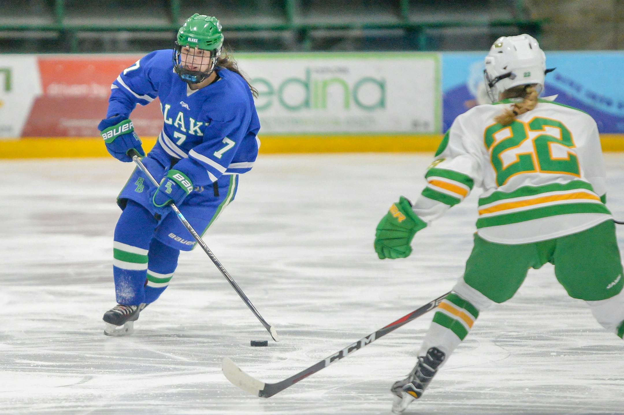 Blake's Lily Delianedis (7) skated with the puck as Edina's Vivian Jungels (22) defended. Blake vs. Edina. January 18, 2019. Photo By Earl J. Ebensteiner, SportsEngine