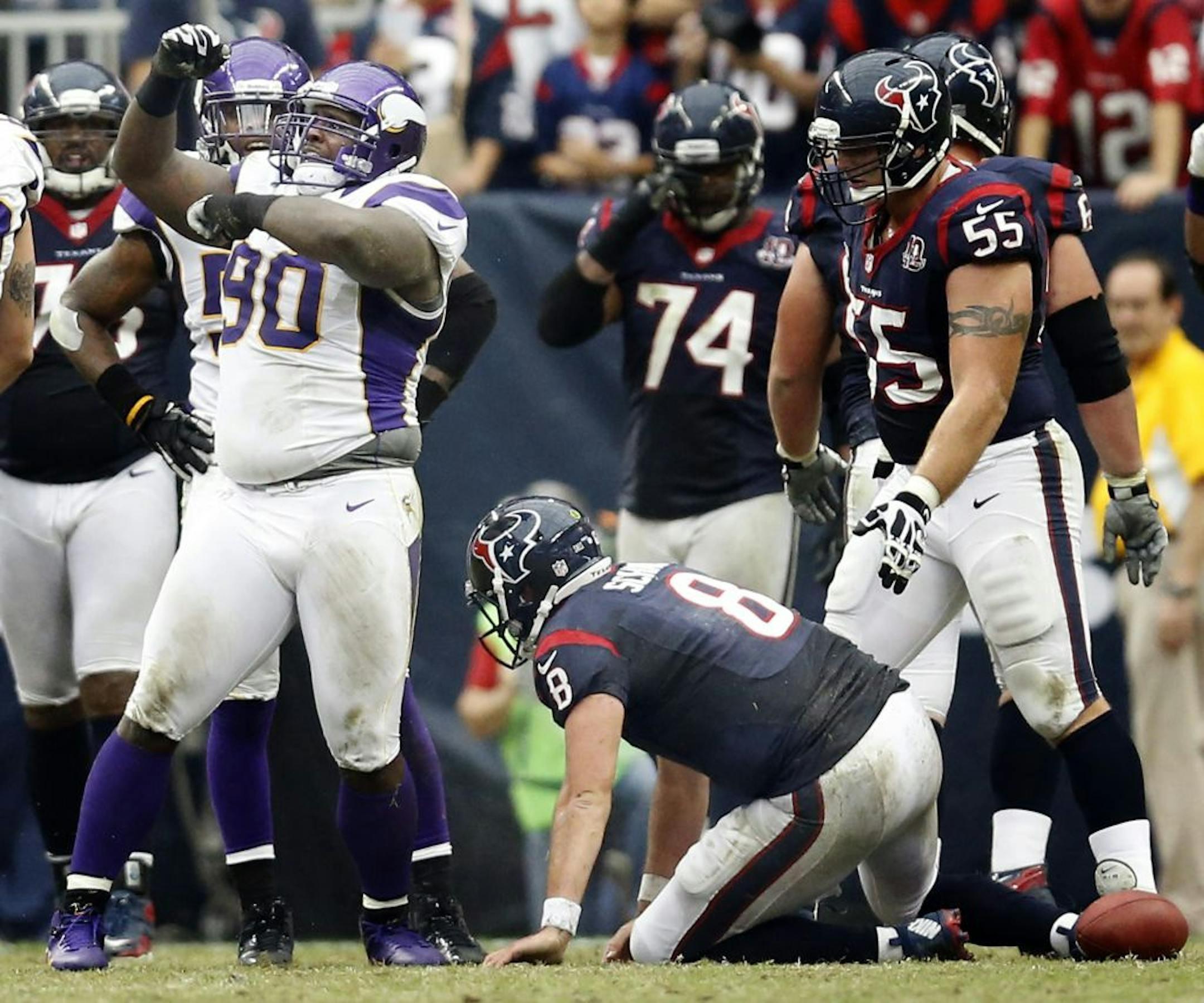 Vikings lineman Fred Evans had cause to celebrate after sacking Texans quarterback Matt Schaub on third down Sunday. Houstion had first and goal from the 1 a few plays earlier but had to settle for a 33-yard field goal.