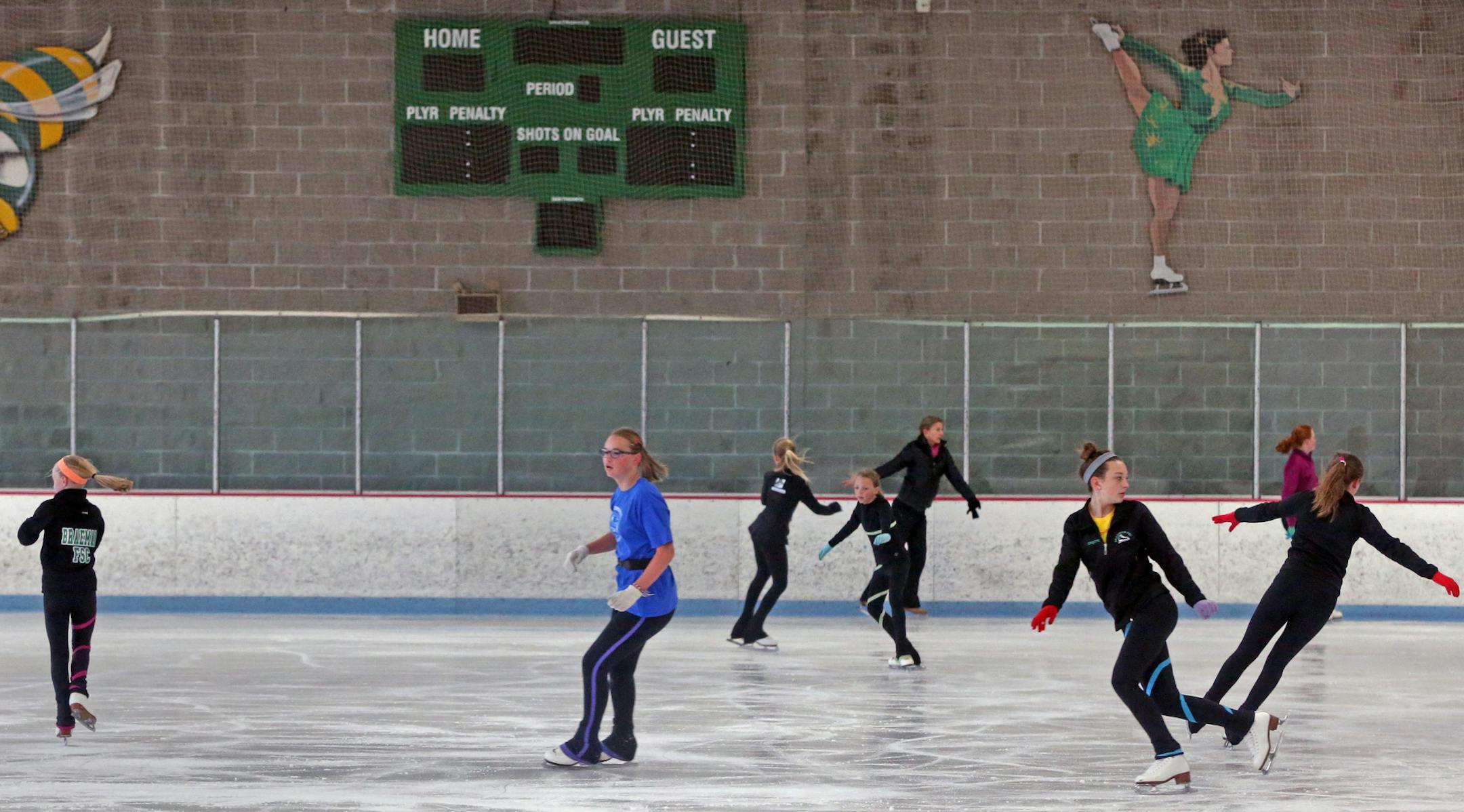 Figure skaters practiced at one of the rinks at Braemar Arena in Edina on 7/18/13. Skating may be skating, but it appears that in Edina hockey and figure skating do not mix. There's a proposal to cut the ice time of the Braemar City of Lakes Figure Skating Club because so many participants are not Edina residents, allowing more time for the Edina Hockey Association. The figure skating club is fighting the proposal, saying it would endanger the club's national and international standing. The City