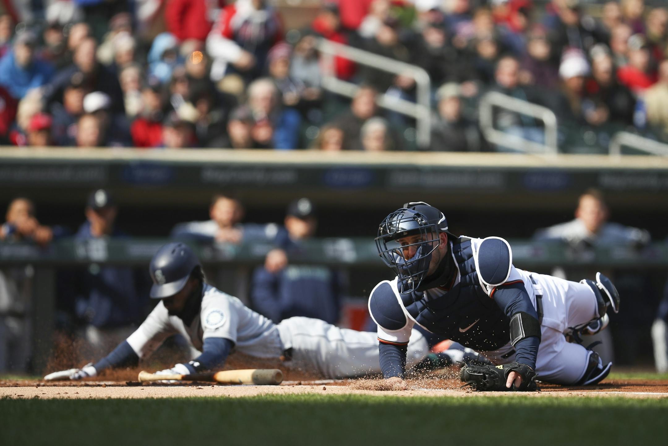 Seattle Mariners center fielder Jean Segura scored on a single by Daniel Vogelbach when the throw from right field was out of the reach of Twins catcher Mitch Garver in the first inning.