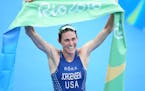 Gwen Jorgensen wins gold for the United States in the women's traithlon on Aug. 20, 2016 in Rio De Janeiro, Brazil.