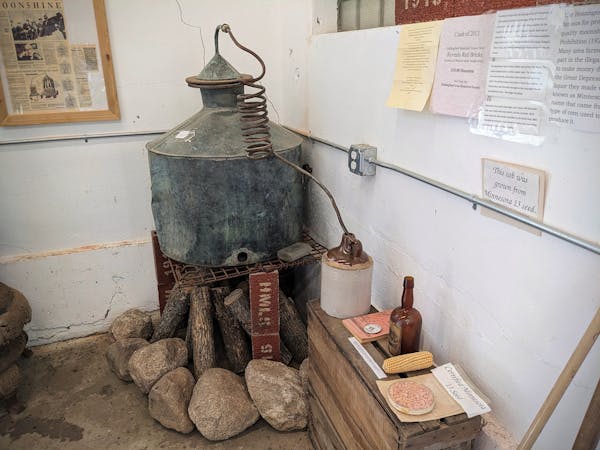 A still dug up from the woods near Holdingford — a hot spot of moonshining during Prohibition — is on display at the city’s history museum.