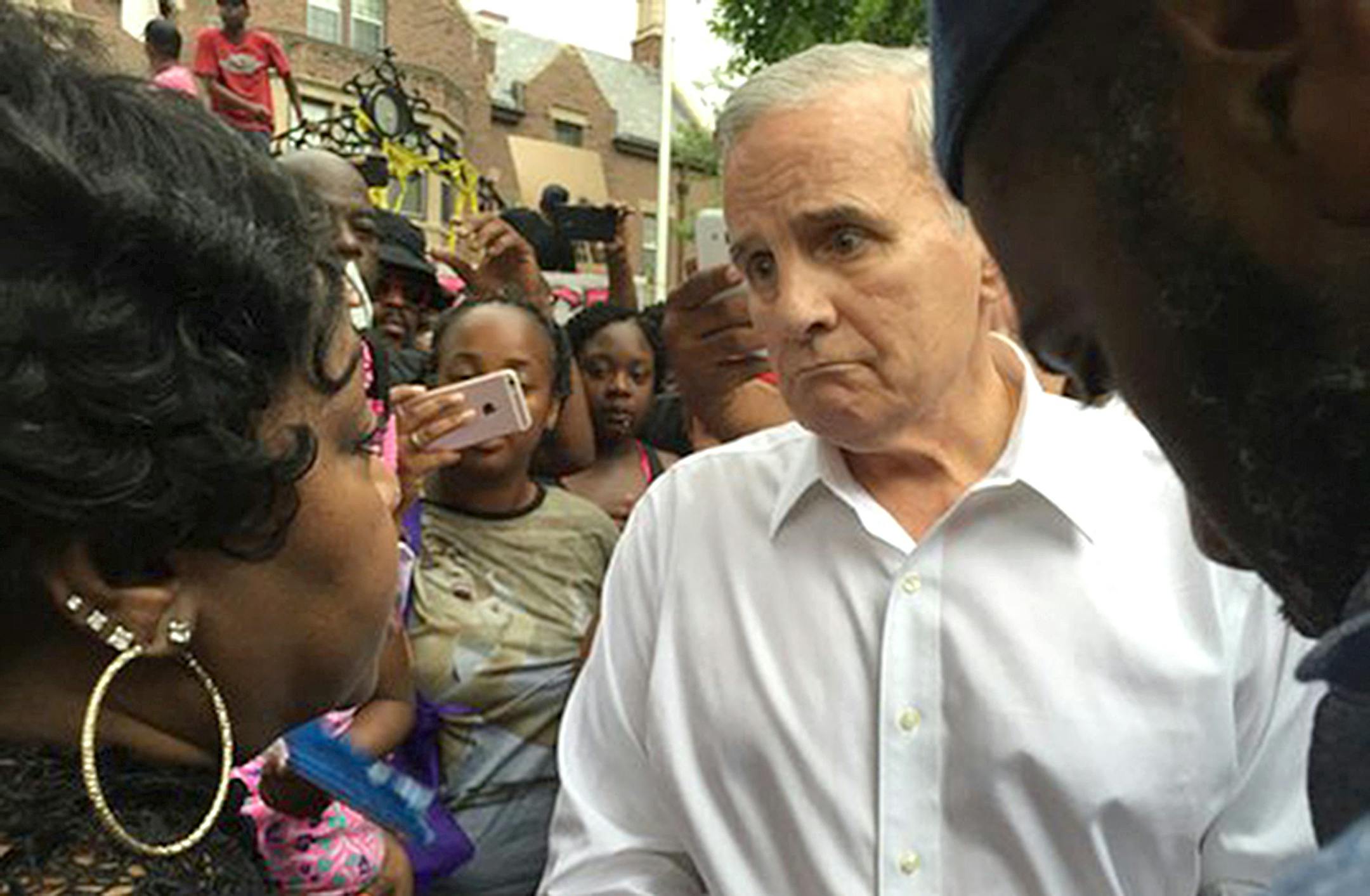 Gov. Mark Dayton talked Thursday night to Valerie Castile, the mother of Philando Castile, outside the governor's residence in St. Paul, the site of a protest march. Star Tribune Photo by Mark Vancleave