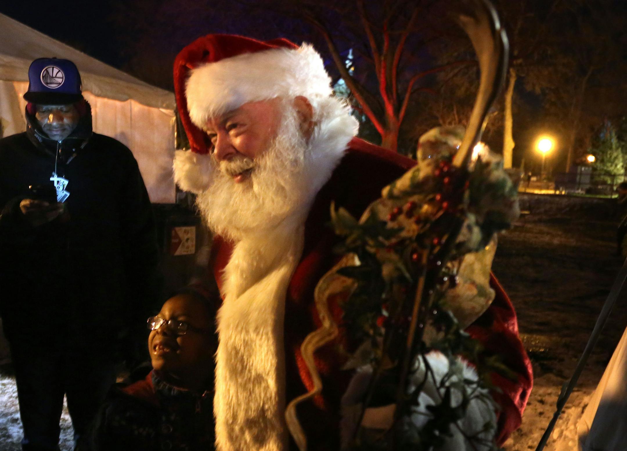 Holidazzle kicked off tonight for the holiday season at Loring Park with fireworks Friday, Nov. 27, 2015, in Minneapolis, MN. Here, Santa made a visit at the event.](DAVID JOLES/STARTRIBUNE)djoles@startribune.com Holidazzle kicked tonight for the holiday season with fireworks at Loring Park Friday, Nov. 27, 2015, in Minneapolis, MN.
