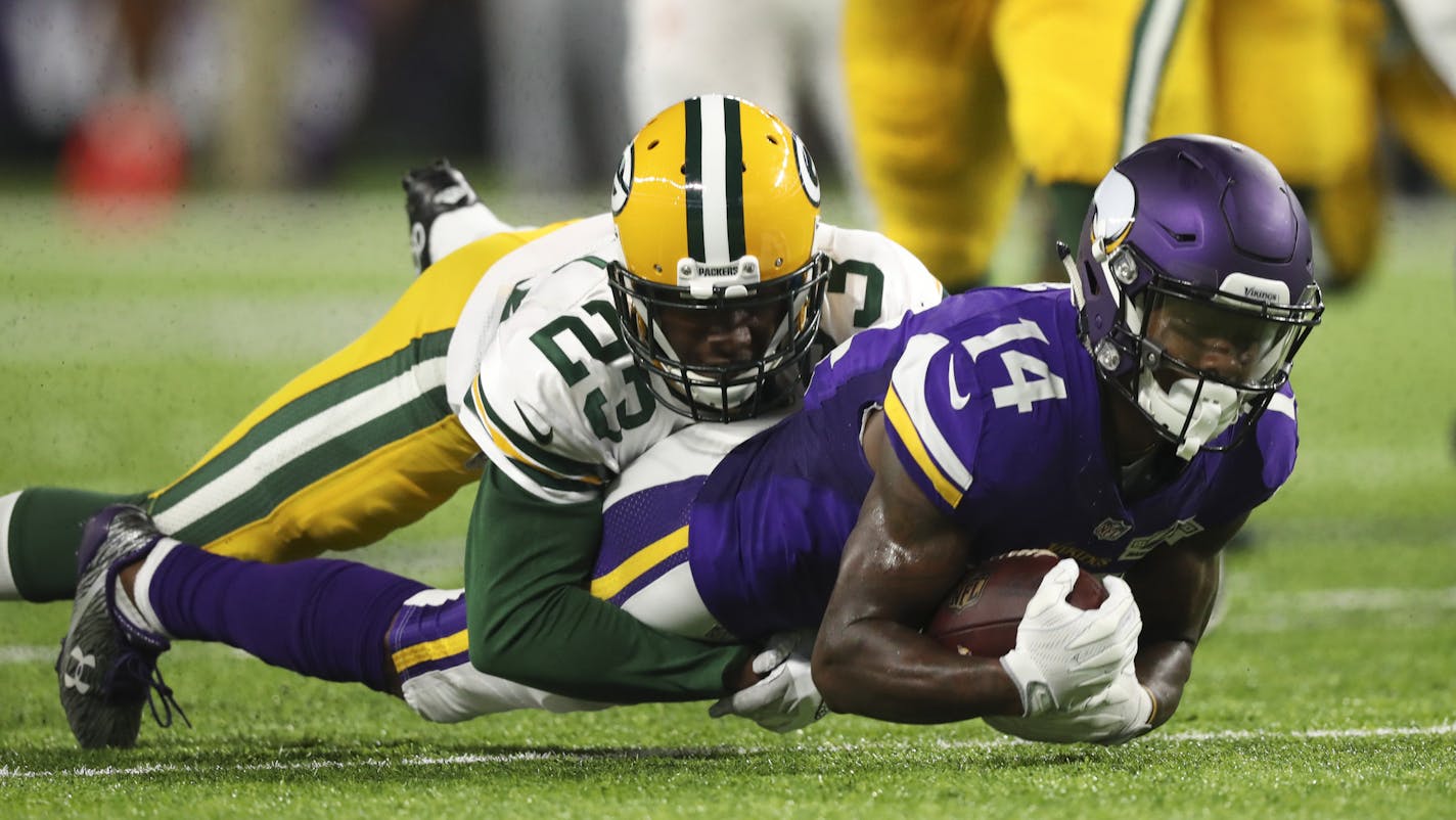 Vikings wide receiver Stefon Diggs (14) was tackled by Green Bay Packers cornerback Damarious Randall (23) after a second quarter pass reception. ] JEFF WHEELER &#xef; jeff.wheeler@startribune.com The Minnesota Vikings and the Green Bay Packers faced each other in their season opener NFL game Sunday night, September 18, 2016 at U.S. Bank Stadium in Minneapolis.