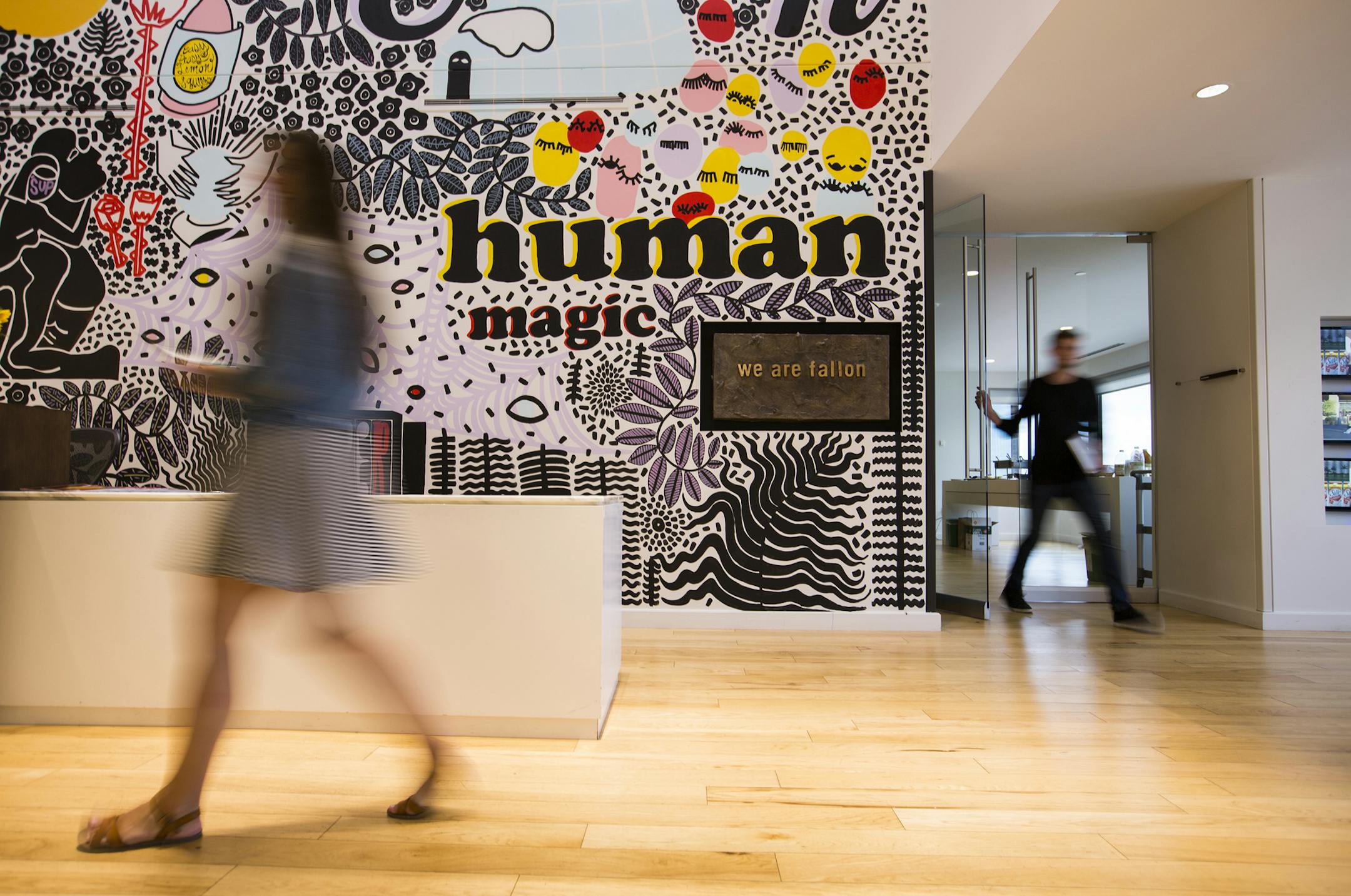 A mural painted by an employee and a metal sign made by melted down awards greets visitors at Fallon ANgency. ] (Leila Navidi/Star Tribune) leila.navidi@startribune.com BACKGROUND INFORMATION: Fallon Advertising Agency office in downtown Minneapolis on Wednesday, August 17, 2016. As the veteran Fallon agency celebrates its 35th anniversary, we sit down with CEO Mike Buchner and talk about the direction of the agency since founder and advertising icon Pat Fallon passed away almost a year ago and