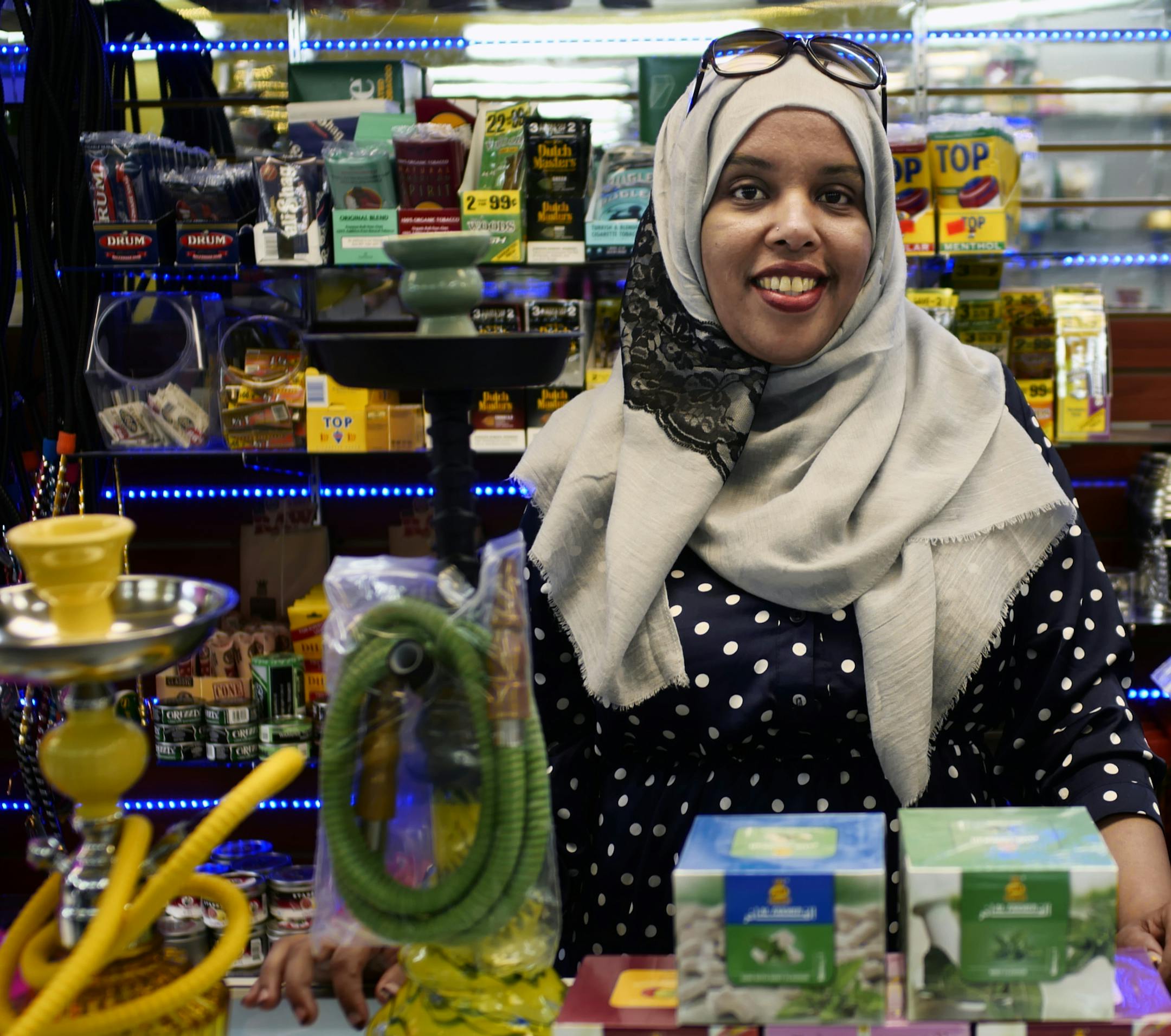 Ekram Mumed, who owns a tobacco shop, couldn’t say for sure whether she’d participate when Open Streets hits E. Franklin Avenue in August.
