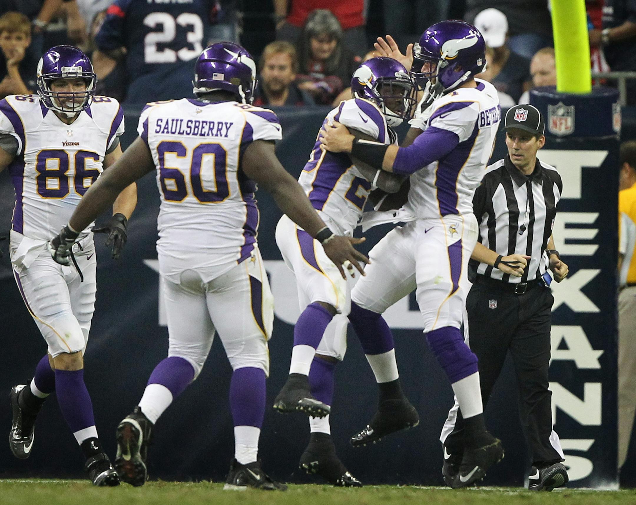 Minnesota Vikings running back Jordan Todman (23) celebrated his touchdown with quarterback McLeod Bethel-Thompson (4) during the Minnesota Vikings last preseason game with the Texans at Reliant Stadium in Houston, Texas Thursday August 30, 2012. Houston beat Minnesota 28-24.
