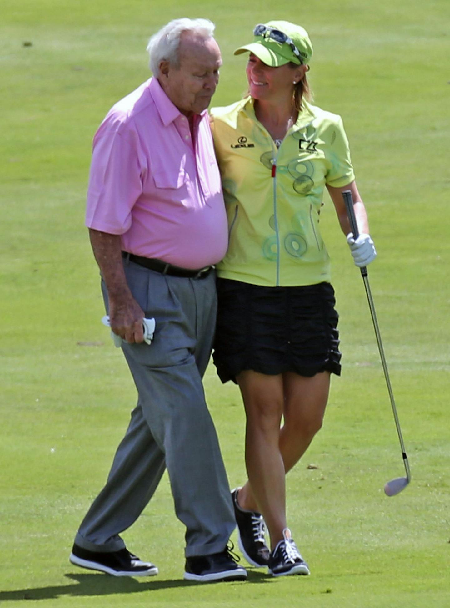 (left to right) Arnold Palmer and Annika Sorenstam walked together during the Greats of Golf Challenge at the 3M Championship at the TPC in Blaine, MN., on 8/3/13.] Bruce Bisping/Star Tribune bbisping@startribune.com Arnold Palmer, Annika Sorenstam/roster.