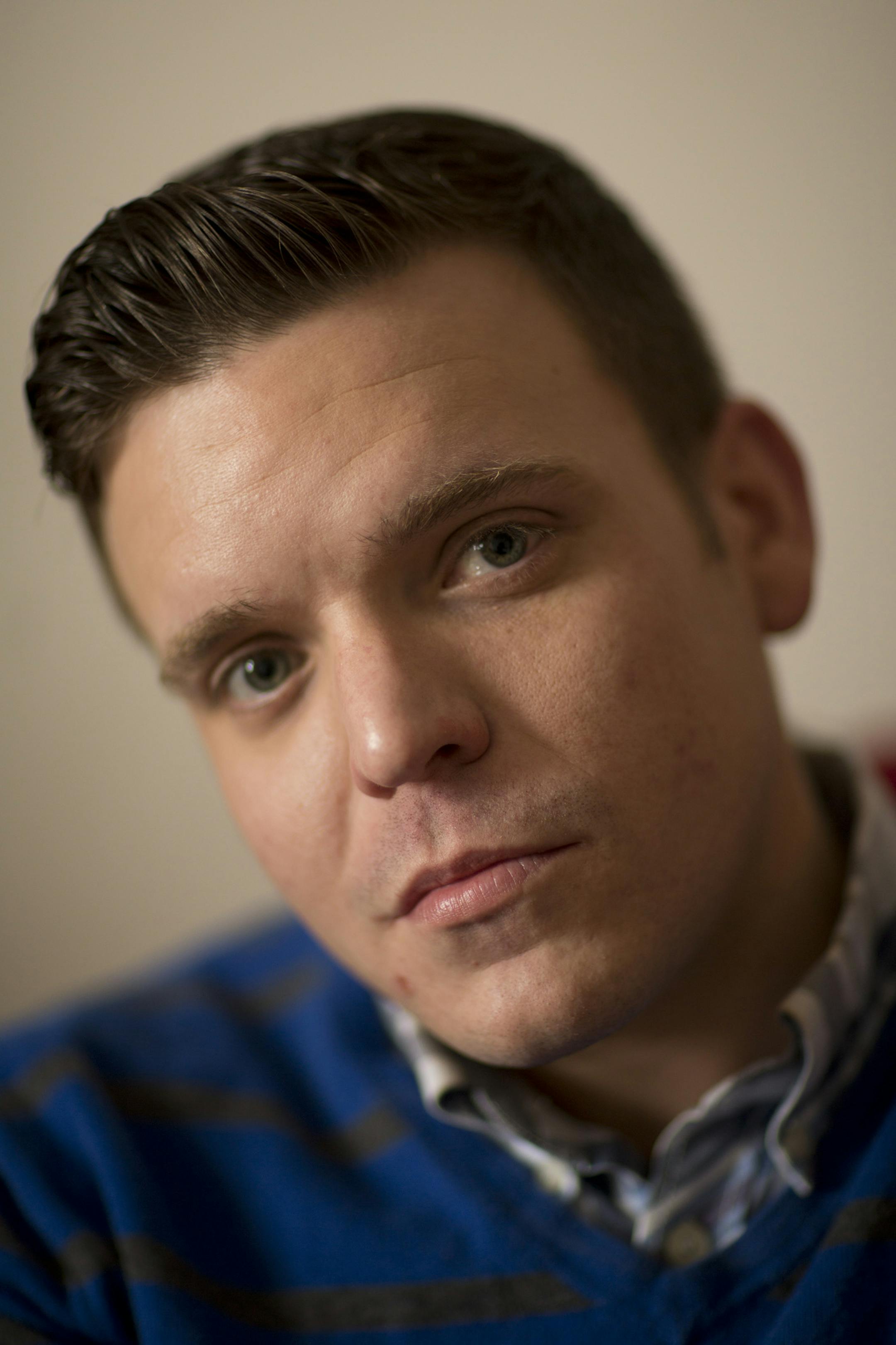 Dylan Berg of Minneapolis is suing the popular Uptown establishment Bar Louie, where he worked as a server, claiming he was fired for disclosing his HIV-positive status. Dylan Berg at home in northeast Minneapolis Thursday afternoon, April 10, 2013. ] JEFF WHEELER ‚Ä¢ jeff.wheeler@startribune.com