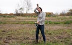 Kristin Pearson wiped her forehead as she harvested carrots at her rented land. She's that rarest of breeds: a young farmer in Minnesota on the cusp o