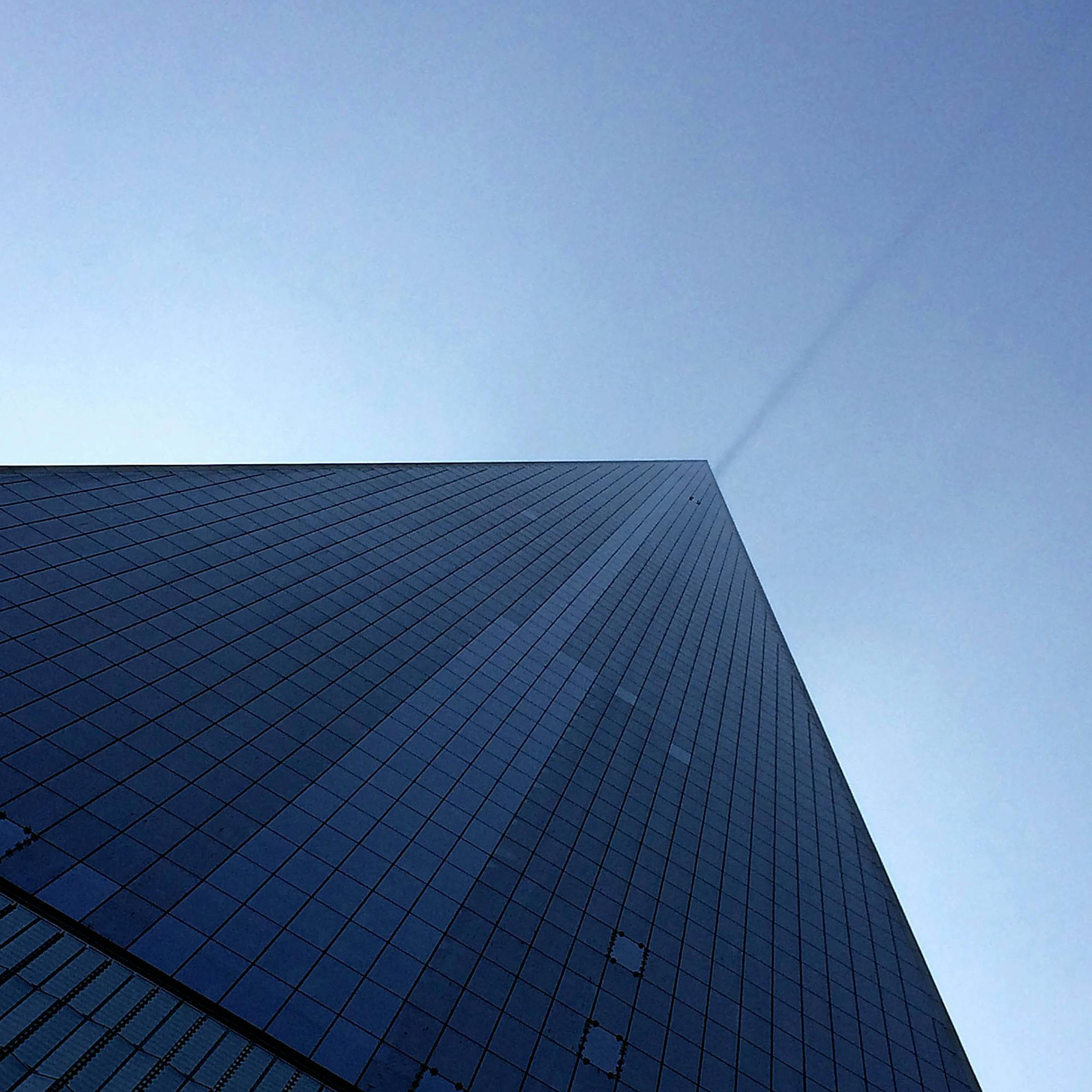 Looking up: Freedom Tower near the 9/11 Memorial in New York City soars into the sky in July 2014. An illuminated antenna will rise from the center of the building to the symbolic height of 1,776 feet.