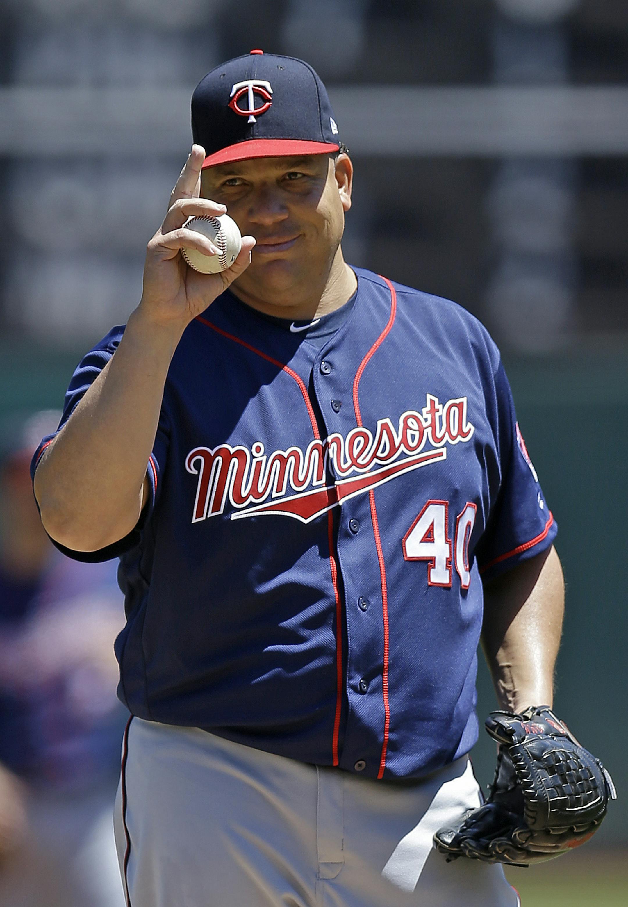 Minnesota Twins' Bartolo ColÛn salutes prior to pitching in the first inning of a baseball game against the Oakland Athletics, Sunday, July 30, 2017, in Oakland, Calif. (AP Photo/Ben Margot)