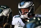 Philadelphia Eagles quarterback Carson Wentz stands in the tunnel before taking on the Arizona Cardinals at State Farm Stadium in Glendale, Ariz. on S