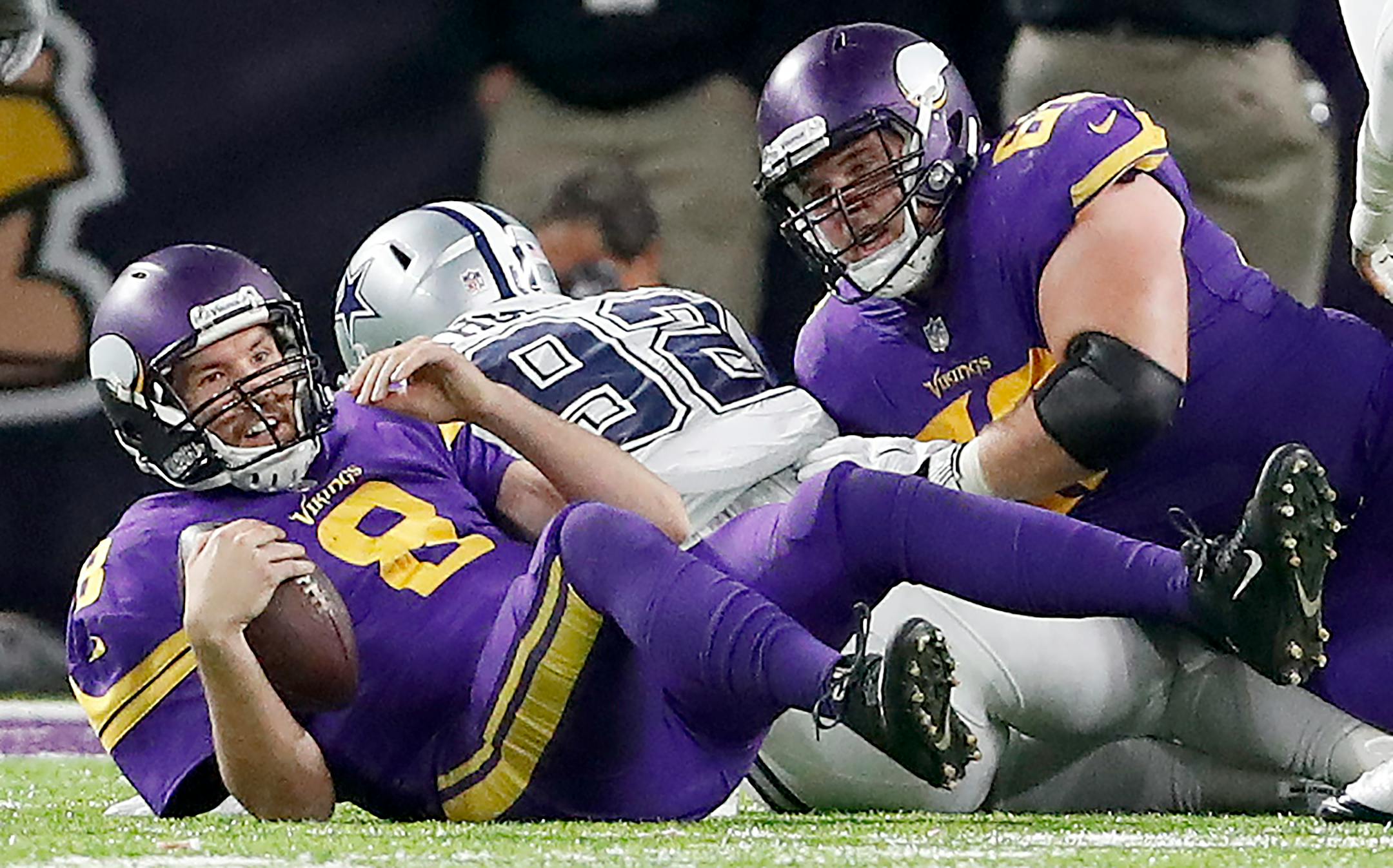 Vikings quarterback Sam Bradford (8) was sacked by Cedric Thornton (92) in the fourth quarter last Thursday. ] CARLOS GONZALEZ cgonzalez@startribune.com - December 1, 2016, Minneapolis, MN, US Bank Stadium, NFL, Minnesota Vikings vs. Dallas Cowboys
