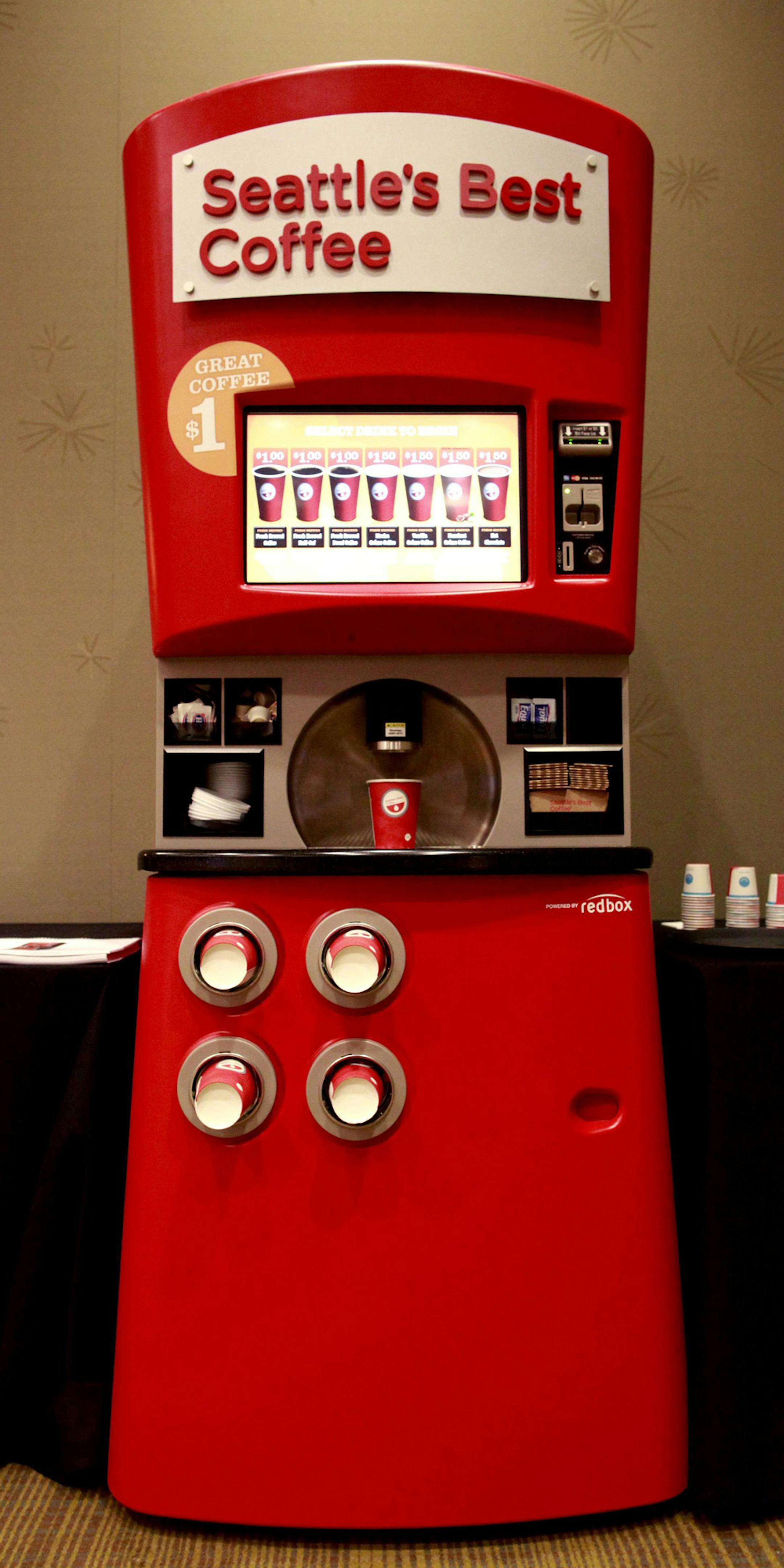 Coinstar, which runs its namesake coin counting machines and Redbox movie rental kiosks, has rolled out new automated retail technology, like this Seattle's Best Coffee machine, that allows consumers to get more done when visiting a store. (Erika Schultz/Seattle Times/MCT) ORG XMIT: 1140381