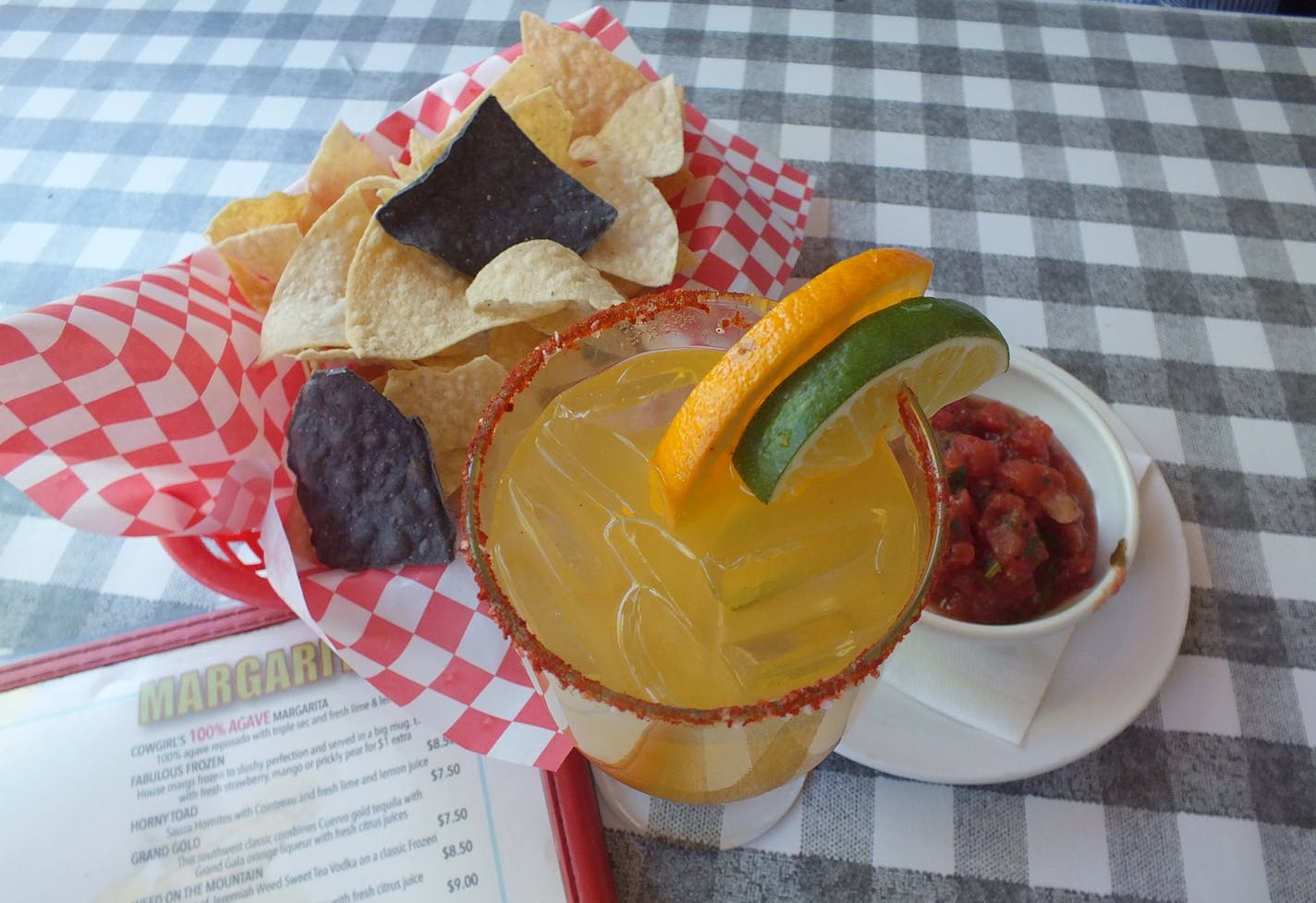Chips and salsa accompany the Cadillac margarita at Cowgirl, a barbecue restaurant near Santa Fe&#x2019;s Railyard District.