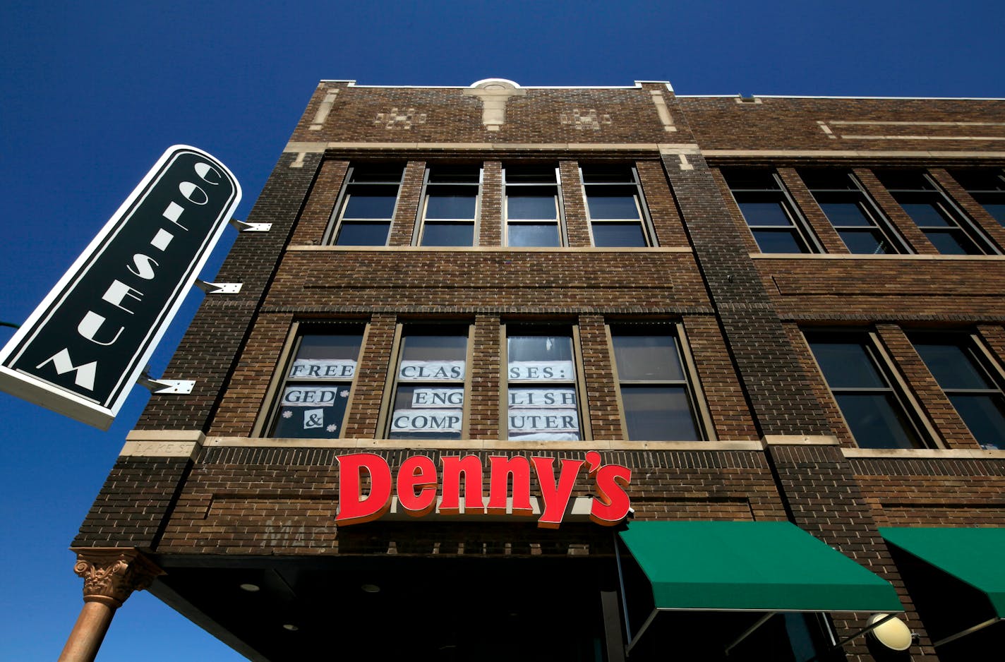 The Coliseum Building at the northeast corner of Lake Street and 27th Avenue East on March 11, 2012. ] JOEL KOYAMAâ€¢joel.koyama@startribune.com An historic but long-troubled commercial building at a key intersection in Minneapolisâ€™ Longfellow neighborhood has new owners, who say they hope to breathe some new life into the landmark property. The Coliseum Building at the northeast corner of Lake Street and 27th Avenue East was purchased out of foreclosure last month for $2.28 million by a group led by Minneapolis real estate investors Larry Hopfenspirger and Dr. Elmer Salovich. According to Hennepin County records, the new owners contributed $1.12 million in equity and signed a contract-for-deed with American Bank of St. Paul for the balance of the sale price. The buildingâ€™s most recent assessed value was $2.8 million. The pair say theyâ€™re looking to build off an ambitious $5.1 million rehabilitation project launched in 1999 by restoration expert Fred Lehmann that aimed to turn the Coliseum Building into a showpiece for the Lake Street-Hiawatha Avenue area. The former owner, with the help of more than a $1 million in tax-increment financing from the city, completed extensive interior renovations and restored its original 1917 faÃ§ade before ultimately falling victim to financial troubles and legal disputes with the city. The 70,000-square-foot, five-story art deco building is home to nonprofit groups such as the Minnesota Literacy Council and the La Oportunidad Latino social services program, as well as a Hennepin County Medical Center health clinic and a Dennyâ€™s Restaurant.