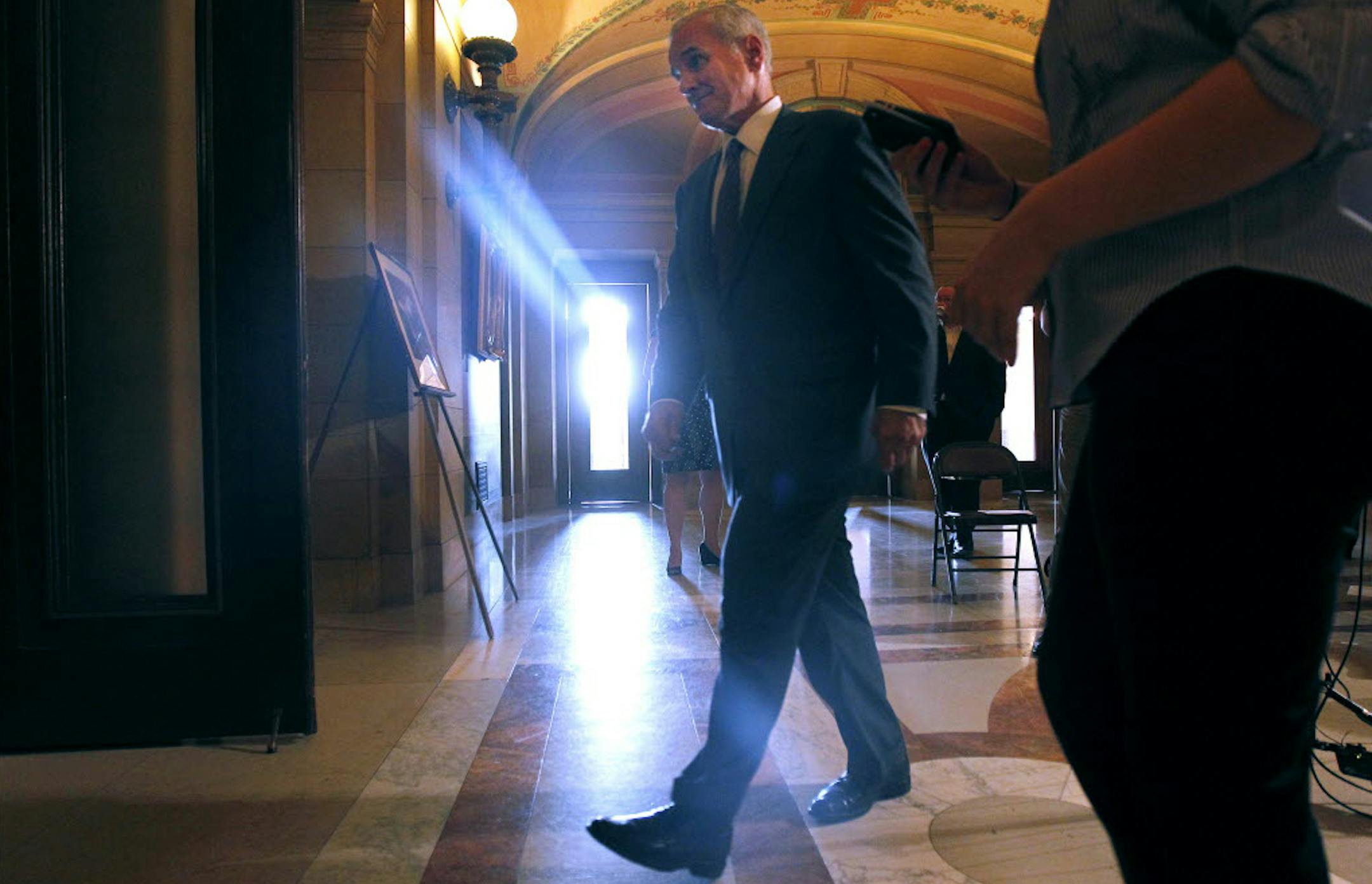 Much left to resolve: Gov. Mark Dayton returned to his office. Monday's proposal was a "meaningful offer," he said.