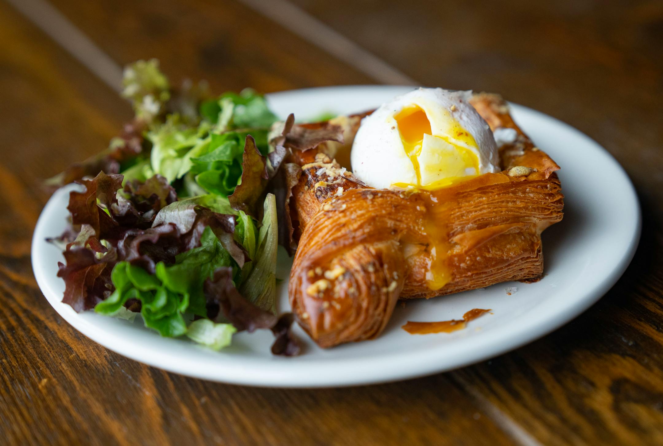 Leek and Lardon danish with a poached egg as seen Thursday, Oct. 27, 2022 at The Lynhall in Minneapolis. ] ALEX KORMANN • alex.kormann@startribune.com