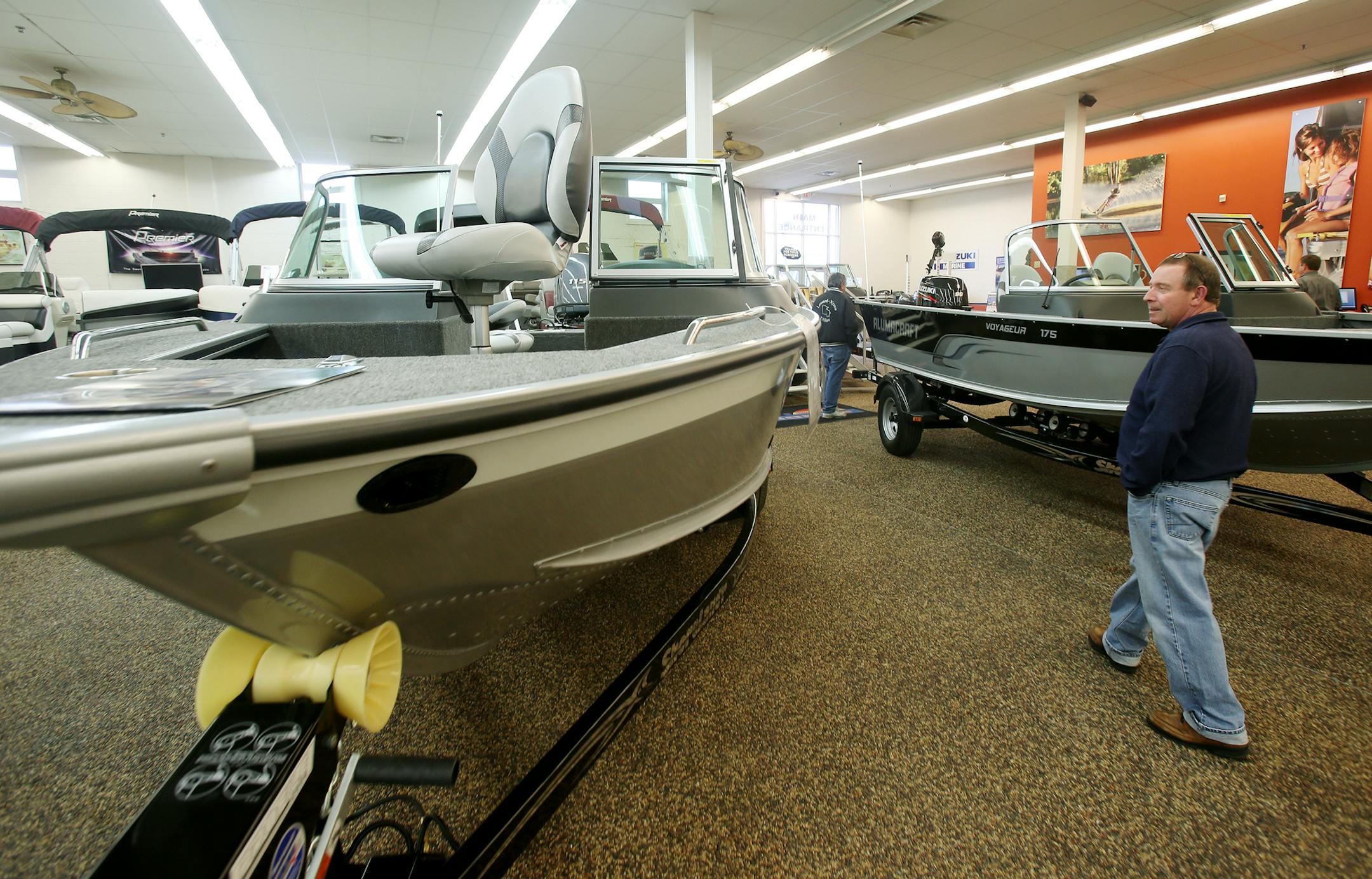 Frank Hartman of Maplewood looked at a few boats in the showroom of Dan's Southside Marine. ] JOELKOYAMA‚Ä¢jkoyama@startribune Bloomington, MN on April 23, 2014.