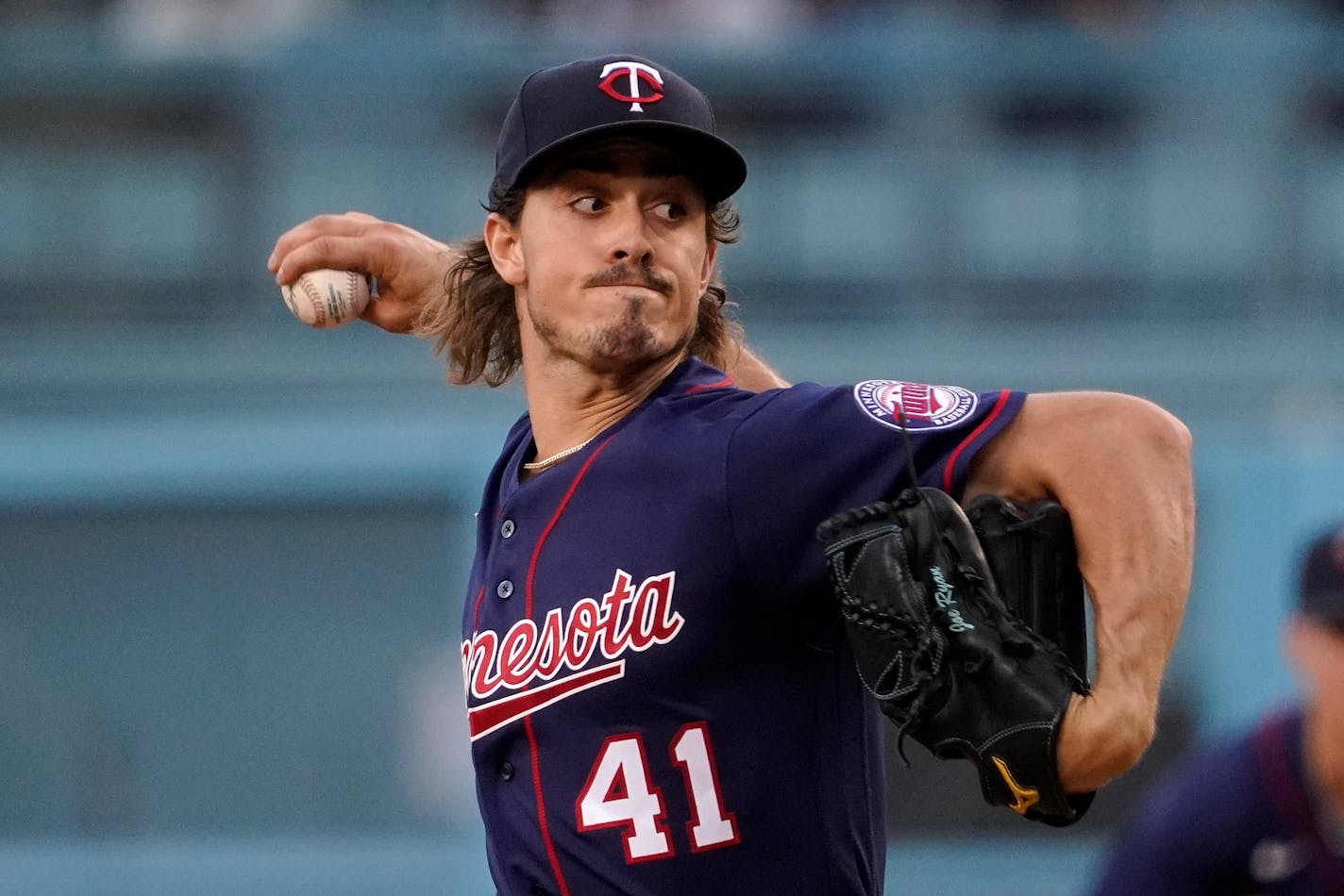 Minnesota Twins starting pitcher Joe Ryan throws to the plate during the first inning of a baseball game against the Los Angeles Dodgers Tuesday, Aug. 9, 2022, in Los Angeles. (AP Photo/Mark J. Terrill)