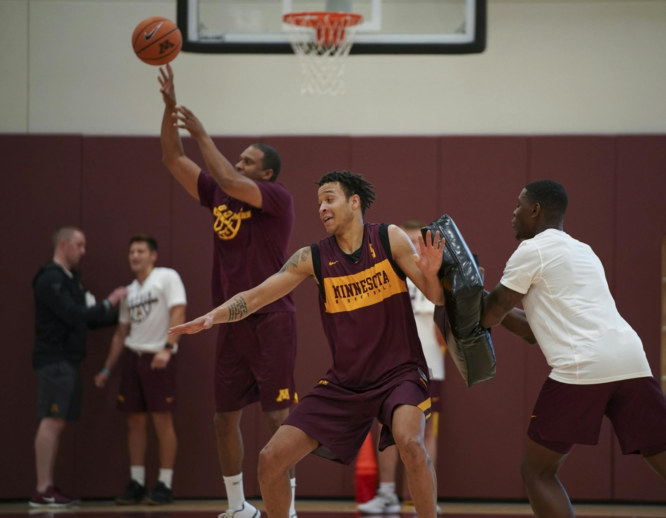 Guard Amir Coffey, coming off an injury from last year, took part in a drill during practice Tuesday afternoon.